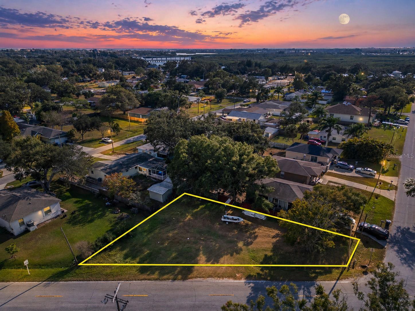 Cleared Corner Lot in Ruskin – No HOA – No CDD-  Utilities Available – City Water & Sewer -  Ready to Build. Prime location just minutes from shopping, restaurants, US-41, Hwy 301, and I-75 giving you fast access to everything the Tampa Bay area offers. Whether you’re heading to downtown Tampa, St. Pete, Brandon, or the beautiful waterfronts of Tampa Bay, you’re always just a short drive away. Huge savings with an existing sewer line, a huge bonus that saves the next owner time and thousands in impact fees. Power is also easy to reconnect with a utility pole located directly in front of the property.  Opportunities like this in Ruskin’s rapidly growing corridor don’t last long especially at a price set to move. Bring your vision and make this property yours today!