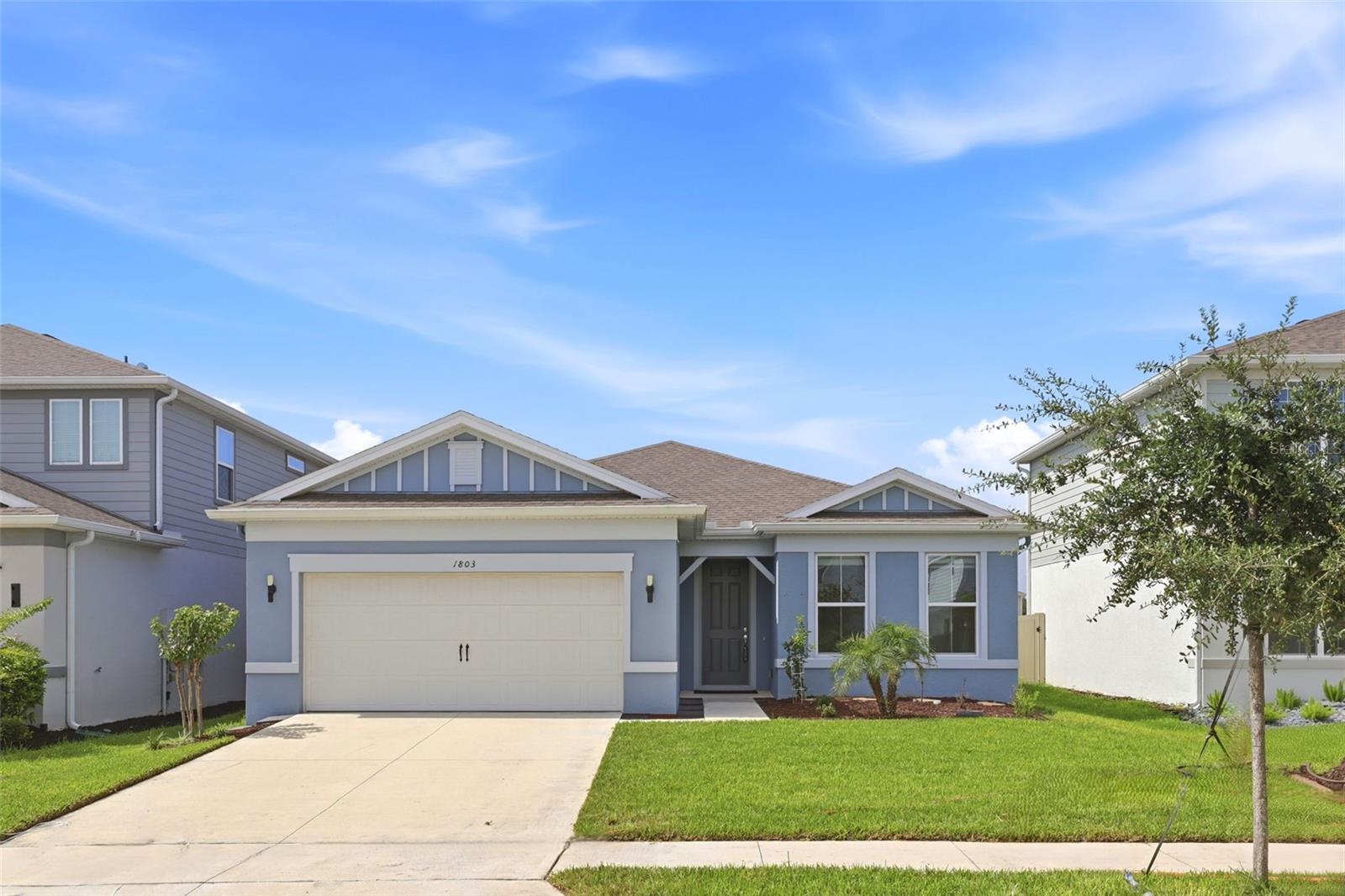 Welcome to this beautifully maintained 2023 home in Amelia Groves, where modern design, quality finishes, and everyday comfort come together in one exceptional package. Offering 4 bedrooms, 3 full bathrooms, a versatile flex room, and over 2,200 square feet of thoughtfully designed living space, this move-in ready home is ready to welcome its next owners.

The heart of the home is an open-concept living area designed for both everyday living and effortless entertaining. The spacious gathering room flows seamlessly into the dining area and beautifully appointed kitchen, featuring quartz countertops, light shaker cabinetry, built-in wall oven and microwave, stainless steel appliances, an oversized island, and abundant storage.

The split-bedroom layout offers privacy for the owner's suite while providing comfortable accommodations for family and guests. A flexible front room can easily serve as a home office, playroom, study, or media room, adapting to your lifestyle as your needs change.

Step outside to the covered lanai and enjoy a backyard with partial fencing, offering space to relax, play, garden, or personalize your outdoor retreat.

Thoughtful upgrades throughout the home include luxury vinyl plank flooring in the main living areas, a tray ceiling in the gathering room, designer light fixtures, Zebra roller shades, hardwired network connections, a Level 2 EV charging outlet, gutters, outdoor security cameras, Samsung refrigerator, Samsung washer and dryer, and a dedicated storage room.

Amelia Groves offers a community pool, playground, and the added benefit of no CDD, while HOA dues include 1 Gigabit Spectrum fiber internet and streaming TV service. Conveniently located between Lake Nona and Downtown St. Cloud, you'll enjoy easy access to major roadways, shopping, dining, parks, and everyday conveniences.

If you're searching for a newer home that combines modern finishes, functional living spaces, and a welcoming community, this beautifully upgraded residence is one you won't want to miss.