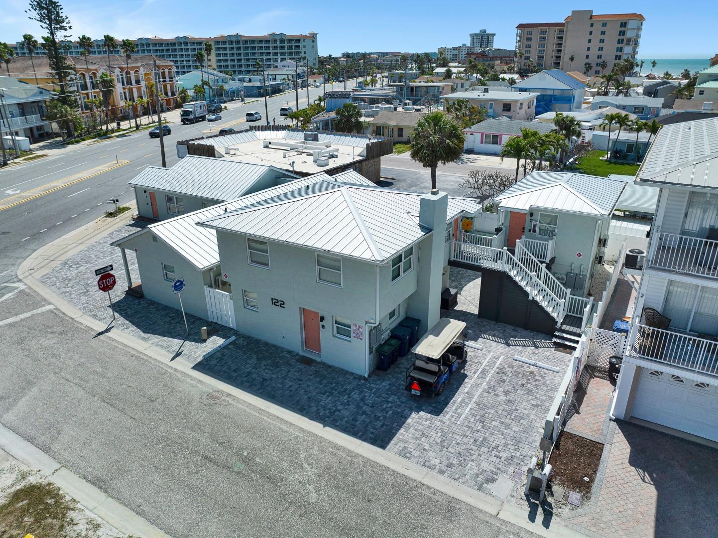 Prime Investment Opportunity: Fully Renovated ~ 8 unit ~ Airbnb Property Steps from the Beach
Nestled less than 450 feet from public beach access, this exceptional property offers an unparalleled opportunity for short-term rental success. Zoned Commercial Tourist Facilities (CTF), it is approved for nightly rentals, making it the perfect choice for an investor looking for passive income along the Gulf Coast Beaches.

Property Highlights;

Complete Renovation: This property has been meticulously upgraded, including a durable aluminum PVD-plated roof, custom impact-resistant windows, and a full electrical rewire with new panels for optimal safety.
Gourmet Kitchens & Spa-Inspired Bathrooms. Each unit features a sleek, European-style kitchen with quartz countertops, glass backsplashes, and premium appliances. The bathrooms have been tastefully updated, new showers, vanities, and modern fixtures.

Premium Finishes: No detail has been overlooked, from the Stiebel tankless water heaters and new mini-split AC systems in 7 of the 8 units to the eco-friendly Cali bamboo long plank flooring.

Cohesive Aesthetic: Every unit shares a uniform, coastal luxury design with the same exquisite materials, including a newly installed permeable paver system and durable new stucco with advanced lathe for long-lasting results.

Outdoor Potential: The property is primed for additional amenities, with power already run underground for a 12-person hot tub in the beautiful central courtyard. There is also ample space to add a pool or spa/hot tub.

Ideal Location: Situated within a block of several popular restaurants and bars, this property also features 8 on-site parking spots for added convenience.

With its impeccable design, unbeatable location, and turn-key status, this property is a prime opportunity for generating substantial income through short-term rentals. Dont miss out on your chance to own this stunning slice of coastal paradise!

(PORTFOLIO PACKAGE AVAILABLE; Property can be purchased with 2116/2114 1st St, Indian Rocks Beach, and/or 2605 Bay Blvd, Indian Rocks Beach)