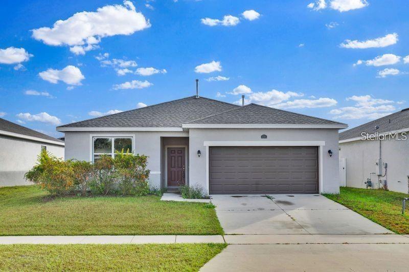 Lake Denham Estates – Move-In Ready Single-Family Home in Leesburg! Welcome to this beautiful single-family home in the desirable Lake Denham Estates community, conveniently located just off Hwy 27 in Leesburg. Offering just under 2,100 square feet of thoughtfully designed living space, this 4-bedroom, 2-bathroom home combines modern style, comfort, and convenience. The open-concept floor plan creates a bright, spacious atmosphere that's perfect for both everyday living and entertaining. A split-bedroom layout provides added privacy, while new luxury vinyl flooring throughout and fresh interior paint make this home truly move-in ready. Built in 2022, this home features a contemporary kitchen with stone countertops, a breakfast bar, and a walk-in pantry. Sliding glass doors lead to the backyard, offering plenty of space to relax or create your own outdoor retreat. A 2-car attached garage adds convenience and extra storage. Enjoy the benefits of low HOA fees with no annual CDD charges. Residents also have access to fantastic community amenities, including a swimming pool and playground. Nestled in a peaceful setting just off Hwy 27, this location offers both serenity and accessibility. You're only 10 minutes from Florida's Turnpike and historic downtown Leesburg, making commuting, shopping, dining, and recreation easily accessible. Priced to sell—don't miss this opportunity to own a like-new home in one of Leesburg's growing communities. Schedule your private showing today!