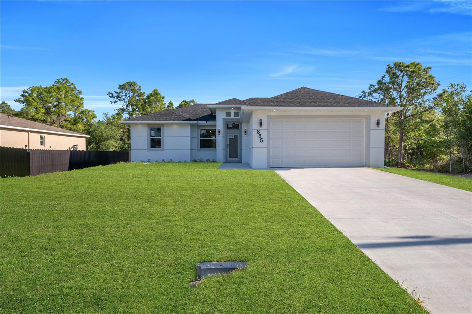 Beautifully designed open-concept home featuring premium finishes throughout, including waterfall quartz countertops, modern cabinetry, brand-new appliances, custom-built closets in every bedroom, and a spacious primary suite with a large walk-in closet. The oversized side access provides ample space for an RV, boat, trailer, or work truck, while the epoxy-coated 2-car garage adds both style and durability. Thoughtfully designed with functionality and modern elegance in mind, this move-in-ready home also offers a motivated seller and closing cost assistance available for qualified buyers.