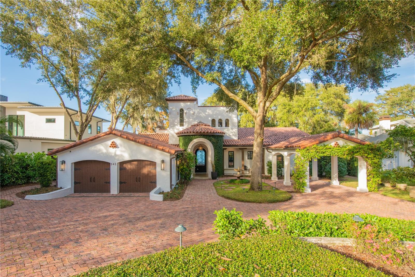 *Price Improvement* The sellers received an unexpected opportunity and are relocating out of state, so the house is priced to sell quickly. Walk in with instant equity in this once in a lifetime lake home.

Welcome to your dream home in the heart of Winter Park, Florida! Nestled in the prestigious Timberlane Shores neighborhood, this exquisite custom-built residence by Farina & Sons offers the perfect blend of luxury and tranquility. With 4 bedrooms, 3.5 baths, and a generous 4,725 sq ft of living space, this home is an Aurora and Parade of Homes Grand Winner and boasts 130 ft of lakefront frontage on the serene Lake Virginia. As you approach this stunning property, you'll find it situated on a quiet cul-de-sac, ensuring peace and privacy. Step into the backyard oasis, where a lanai with a gas fireplace invites you to unwind and enjoy Florida's beautiful weather. Relax in the hot tub or take a dip in the pool equipped with an Ultraviolet System which ensures the healthiest pool water possible, complete with an outdoor shower. The outdoor home lighting creates an enchanting ambiance, while the boat dock with a covered electronic boat lift offers easy access to water adventures. Experience breathtaking sunrises and sunsets over Rollins and Knowles Chapel from your own piece of paradise. The first floor of this home is designed for both comfort and style. Anderson doors and windows fill the space with natural light, highlighting the wood floors and architectural details like coffered ceilings with wood beams in the open family room. The master suite serves as a private retreat, featuring a spa bathroom, custom closets, and ample storage. Two additional bedrooms, a bathroom, and a half bath provide versatility and convenience. The kitchen is a chef's delight, boasting Caesarstone concrete countertops, a copper hood range, top-of-the-line Subzero and Viking appliances, walk-in pantry. A walk-in bar and wine room enhance the home's functionality, while a Pelican whole house water filtration system and a Kangen Leveluk water purifier ensure the highest quality water. The second floor is perfect for entertaining, offering a spacious area with a bonus room, bar, kitchenette, and an additional bedroom with an en-suite bath. This versatile space is ideal for hosting guests or creating a personal retreat. The city of Winter Park has approved plans to add an enclosed 385 square feet to the second floor, providing potential for additional space. Don't miss the opportunity to own this extraordinary lakefront home in one of Winter Park's most sought-after neighborhoods. Experience luxury living at its finest with unparalleled lakefront views, exceptional amenities and convenience to all the restaurants and shopping that Winter Park has to offer.