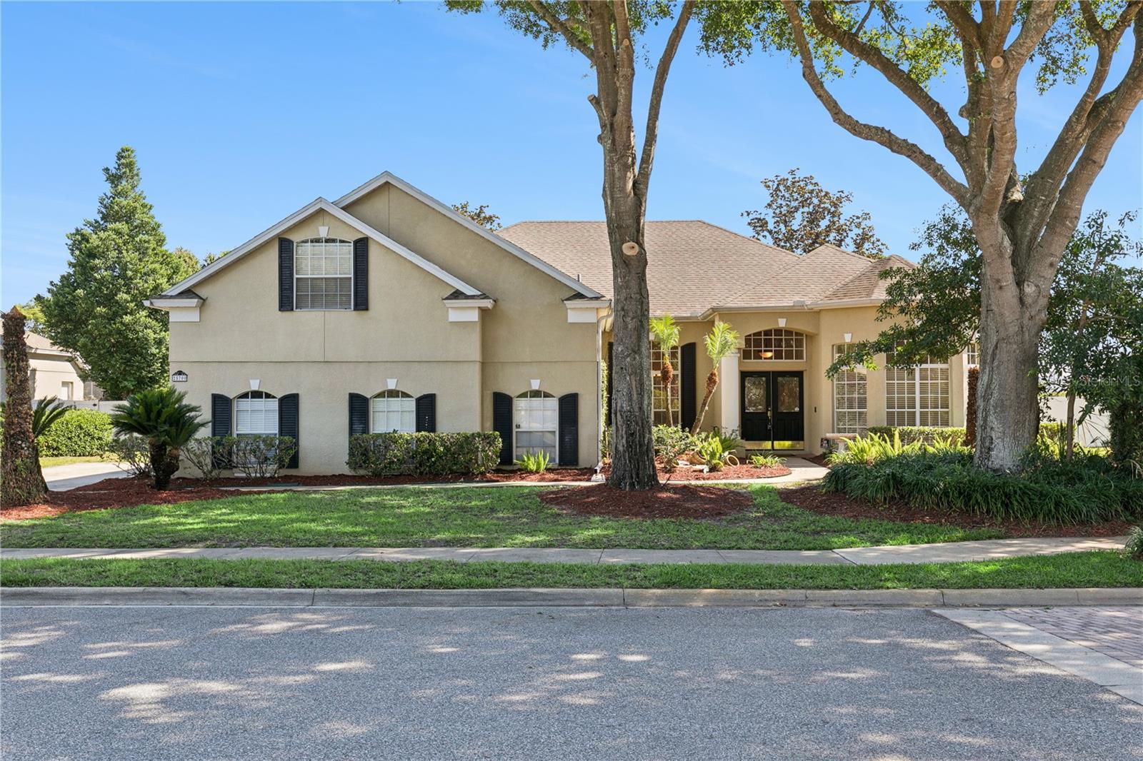 LOOK NO FURTHER- you have found the home of your dreams!! Located in the gated community of Berington Club, nestled between Lake Mary and Sanford, this beautifully maintained home offers the perfect blend of comfort, functionality, and style. Situated on an oversized corner lot with serene wooded views, the property welcomes you with abundant natural light, soaring ceilings, and spacious living and dining areas ideal for everyday living and entertaining.

The open-concept family room features a custom wine and coffee bar with designer backsplash, wine refrigerator, and custom cabinetry — creating a standout space for hosting and relaxing alike. The thoughtfully designed split floor plan offers generously sized bedrooms and a spacious primary suite complete with a large en suite bathroom.

Step outside to your private backyard retreat featuring a resort-style pool with beach entry, solar heating, paver deck, and an inviting outdoor fireplace — truly designed for year-round entertaining and enjoyment.

Additional highlights include an oversized upstairs bonus room perfect for a media room, game room, home office, or flex space. Conveniently located near shopping, dining, major highways, and within a highly sought-after Seminole County school district, this exceptional home offers the lifestyle you’ve been waiting for. Seller is offering a $10,000 credit towards updates payable at closing.