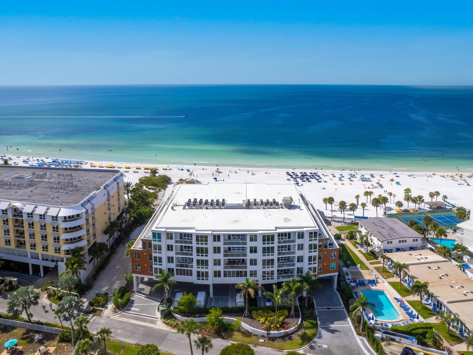 Discover Coastal Luxury at Ten35 Seaside! Welcome to Ten35 Seaside on Siesta Key, where elegance meets the Gulf of Mexico. Unit #305 is a direct Gulf-front retreat offering 3 bedrooms, 3.5 bathrooms, and 2,232 square feet of beautifully designed living space.

This residence is the epitome of modern coastal living, featuring an open-concept floor plan with seamless transitions between spaces. The gourmet kitchen, featuring high-end appliances, seamlessly transitions into the dining and living areas, leading to a 38-foot private terrace with stunning Gulf views. Floor-to-ceiling hurricane-impact windows fill the space with natural light, while automatic shades offer comfort and ease.

The large primary bedroom is a luxurious sanctuary, offering stunning Gulf views, a spacious walk-in closet, and a spa-inspired en suite bathroom with dual vanities and a walk-in shower. This serene retreat is designed to make every day feel like a vacation.

Step onto your private terrace and immerse yourself in the serene beauty of the Gulf, whether enjoying morning coffee, watching vibrant sunsets, or entertaining guests. With private beach access, you can take full advantage of the pristine shoreline, complete with personalized beach service where attendants set up your chairs and umbrellas for ultimate relaxation.

Ten35 Seaside offers an array of luxurious amenities, including on-site property management, fitness center, beachfront pool and spa, grilling stations, fire pit, and private cabanas for your enjoyment. Located on the peaceful south end of Siesta Key, this exceptional property is close to many dining options and gift shops, while Siesta Key Village is just a short drive away.

A piece of Siesta Key paradise awaits you at Ten35 Seaside. Don’t miss the opportunity to make this Gulf-front dream home yours. Schedule your private tour of Unit #305 today!