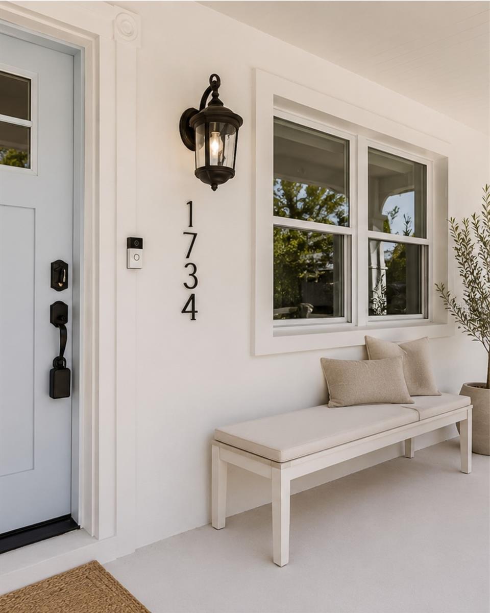 Showing begin Friday, July 10. Welcome to 1734 Maryland Avenue NE, a thoughtfully updated St. Petersburg home offering 3 bedrooms, 2 bathrooms, 1,230 square feet, and the kind of easy indoor outdoor living that makes Florida feel like home. Light filled interiors, vaulted architectural details, warm wood look flooring, and a crisp neutral palette create a bright, relaxed feel throughout.

At the heart of the home, the updated kitchen features updated cabinetry, quartz countertops, stainless steel appliances, sleek fixtures, open wood shelving, and a central island that flows seamlessly into the living and dining spaces. The flexible floor plan offers multiple options for everyday living, working from home, hosting guests, or creating a secondary lounge or bonus space.

Outside, the private backyard is framed by tropical greenery and offers room to unwind, entertain, garden, or make the space your own. A covered deck adds another layer of usable outdoor living, while the additional detached structure creates even more flexibility for storage, a creative studio, home gym, or future bonus space.

Located in the Shore Acres area, just minutes from neighborhood parks, recreation, waterfront surroundings, and the dining, shopping, museums, and energy of Downtown St. Petersburg, this home brings together thoughtful updates, flexible living, and a location that keeps you connected to the best of St. Pete.