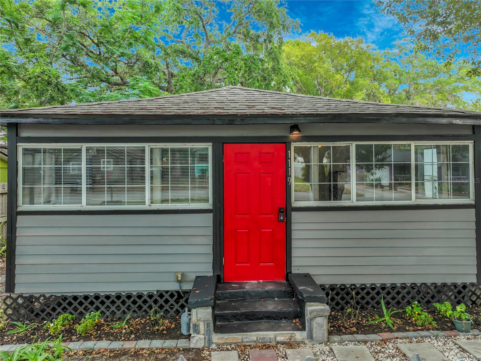 Come see this charming 3-bedroom, 1-bath home featuring a detached studio with its own full bathroom. The studio is currently used as a salon, however this versatile space offers endless possibilities—create a home office, guest suite, hobby room, fitness studio, or whatever best fits your lifestyle. Inside this home, you'll find an inviting open floor plan with updated flooring throughout. The primary bedroom includes a dedicated office nook, providing the perfect work-from-home setup. All appliances, including the washer and dryer, convey with the home, making your move even easier. Step outside to enjoy the fully fenced backyard, offering plenty of room for play or entertaining. An additional large storage shed provides ample space for tools, equipment, and seasonal items. Best of all, there is no HOA. Conveniently located just minutes from Downtown Sanford, you'll enjoy easy access to the RiverWalk, parks, sports complex, restaurants, shopping, SunRail, Amtrak, and Sanford International Airport. This home is a must-see!