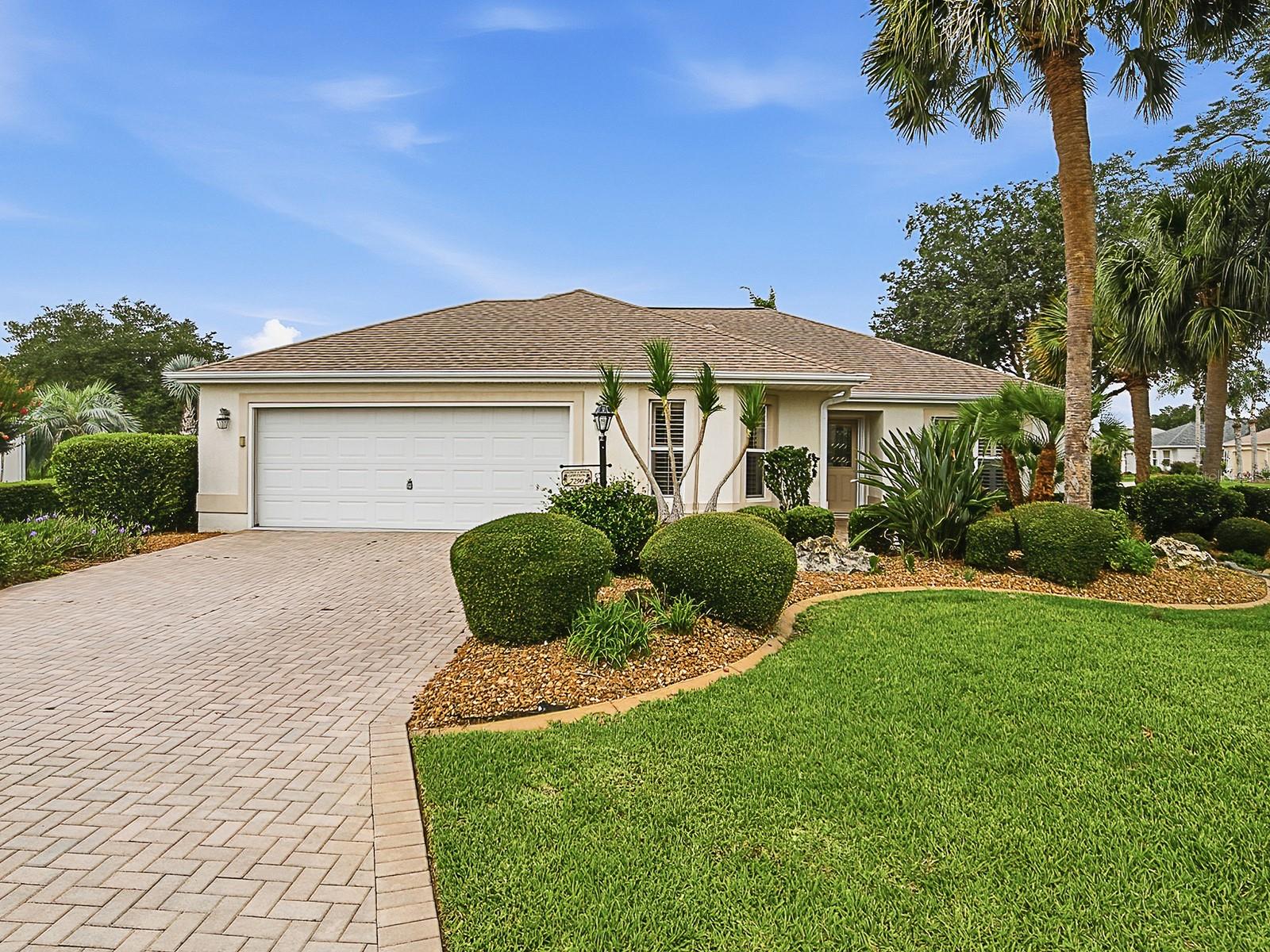 ~•Bond is PAID•~ ~•New ROOF 2020•~ ~•New HVAC 2020•~ ELEGANTLY UPDATED JASMINE in the Village of Chatham with a GOLF COURSE VIEW! From the moment you arrive, you'll appreciate the home's outstanding curb appeal, highlighted by an attractive PAVER driveway and beautifully UPDATED landscaping. This 3-bedroom, 2-bath block and stucco JASMINE Designer home offers outstanding upgrades, quality finishes, and an attractive VIEW of Amberwood GOLF COURSE. The OPEN floor plan features VOLUME CEILINGS, large TILE flooring THROUGHOUT, and PLANTATION SHUTTERS THROUGHOUT the home. The beautifully updated kitchen showcases MAPLE wood cabinetry, GRANITE countertops, STAINLESS appliances, and a GAS range. The spacious primary suite includes a CUSTOM California WALK-IN Closet and an upgraded EN-SUITE bath (w/pocket door) featuring MAPLE cabinetry, GRANITE countertops, a SOLID-SURFACE shower, and FRAMELESS GLASS doors. The guest bath has also been tastefully renovated with matching MAPLE cabinetry, GRANITE countertops, and a SOLID-SURFACE walk-in shower with FRAMELESS GLASS enclosure. One guest bedroom includes a built-in MURPHY BED, offering flexibility for guests and office space. Enjoy your morning coffee or evening cocktail from the ACRYLIC-ENCLOSED lanai overlooking the 7th hole of Amberwood Golf Course. On one side of the lanai you have the golf course view, on the other side the lanai overlooks a delightful POND and ROCK WATERFALL FEATURE that attracts birds and butterflies while providing a serene setting to unwind. Additional attractive features include an INDOOR LAUNDRY (w/Pocket Door) and an EXPANDED garage with EPOXY-coated flooring. 

Major improvements include a NEW ROOF (2020) and NEW HVAC (2020). This move-in ready home combines style, comfort, convenience, and a view! Great location that is easy in & out of The Villages w/light traffic even in PEAK Season! Just a gentle walk or quick golf cart ride to Chatham Rec Center & Family Pool. Also Nearby - the new fabulous “First Responders” Recreation Center with Walk-in Pool, Pitch-N-Putt Golf Course, PICKLEBALL, and more! Close to Nancy Lopez Country Club, Several Pools (Adult & Family) and Mulberry Grove Rec Center. Shopping, Banking, Restaurants and the VA Center are nearby! Tax line reflects property taxes only, and is estimated. Bond is PAID. Current Maintenance Assessment is $879/year. Current Fire Dept. $284/year. Note: Square footage information is taken from the Public Record and is deemed reliable, but not guaranteed. Room and garage dimensions are approximate: buyer to verify