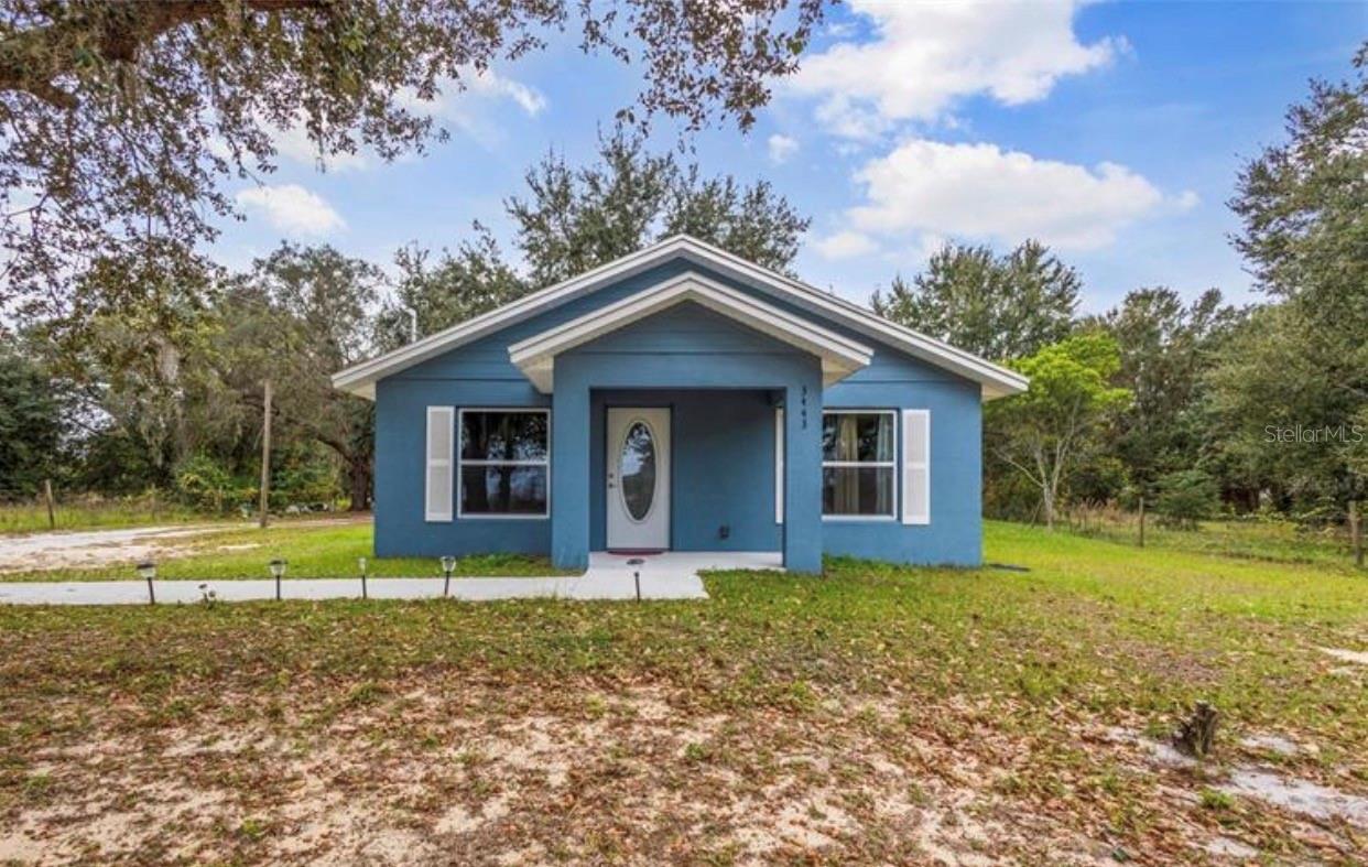 Welcome to your dream home! This brand new, 2-bedroom, 2-bathroom gem built in 2022 is a rare find offering modern luxury and the tranquility of country living, all while being just a 2-minute drive from the highway for ultimate convenience. With over one acre of land, you'll enjoy unparalleled privacy without the restrictions of an HOA. Easy option to build an add-on or additional home. Envision a garage where the park pad is with an extra two bedrooms and family room extending from the kitchen!

As you step inside, you'll be captivated by the contemporary design and high-quality finishes throughout. The heart of the home features stunning granite countertops, complemented by sleek stainless steel appliances that make this kitchen a chef's delight. Imagine entertaining guests in this stylish and functional space, creating memories that will last a lifetime.

The open floor plan seamlessly connects the living and dining areas, providing a spacious and welcoming atmosphere. Large windows allow natural light to flood the interior, highlighting the craftsmanship and attention to detail that went into every aspect of this new build.
The two bedrooms offer cozy retreats, perfect for relaxation after a busy day. The well-appointed bathroom boasts modern fixtures and finishes, ensuring both style and comfort.

Escape the hustle and bustle of city life without sacrificing convenience. The location provides easy access to the highway, making your commute a breeze and offering the freedom to explore nearby attractions. Whether you're looking for a quiet evening on your expansive property or a quick drive to nearby amenities, this home strikes the perfect balance.

Don't miss the opportunity to own a slice of paradise with this thoughtfully designed, brand new home. If you crave the privacy of country living without sacrificing accessibility, this property is your answer. Schedule a showing today and make this haven your own!