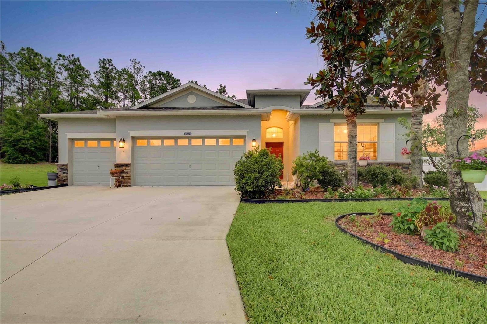 Backing to a wooded area for added privacy and situated on an oversized cul-de-sac lot, this beautifully maintained Monroe II floor plan in sought-after Stoneybrook Hills offers 3 bedrooms, 3 bathrooms, a dedicated office/den, and a spacious 3-car garage. Thoughtfully designed for both everyday living and entertaining, the home features a formal living room, formal dining room, family room, crown molding, and abundant storage throughout. The office/den could easily serve as a fourth bedroom, guest room, or hobby space.
The kitchen is the heart of the home with granite countertops, rich espresso cabinetry, stainless steel appliances, a center island with bar seating, and a sunny breakfast nook overlooking the backyard. The open-concept design flows seamlessly into the family room, creating the perfect gathering space for family and friends.
The spacious primary suite offers two walk-in closets and a well-appointed bath featuring dual vanities, a garden tub, separate shower, and private water closet. The split-bedroom layout provides privacy for family and guests, while the additional bedrooms and bathrooms offer flexibility for multigenerational living or an in-law suite setup.
Step outside to the screened lanai and enjoy peaceful views of the mature trees and private backyard setting. With no rear neighbors, mature landscaping, and plenty of room to relax or play, this outdoor space is a rare find. Additional highlights include a new roof completed in 2023, ample closet space throughout, and pride of ownership that shows at every turn.
Residents of Stoneybrook Hills enjoy 24-hour guarded gate security, a clubhouse, community pool, tennis courts, playgrounds, and convenient access to shopping, dining, major roadways, and historic downtown Mount Dora.