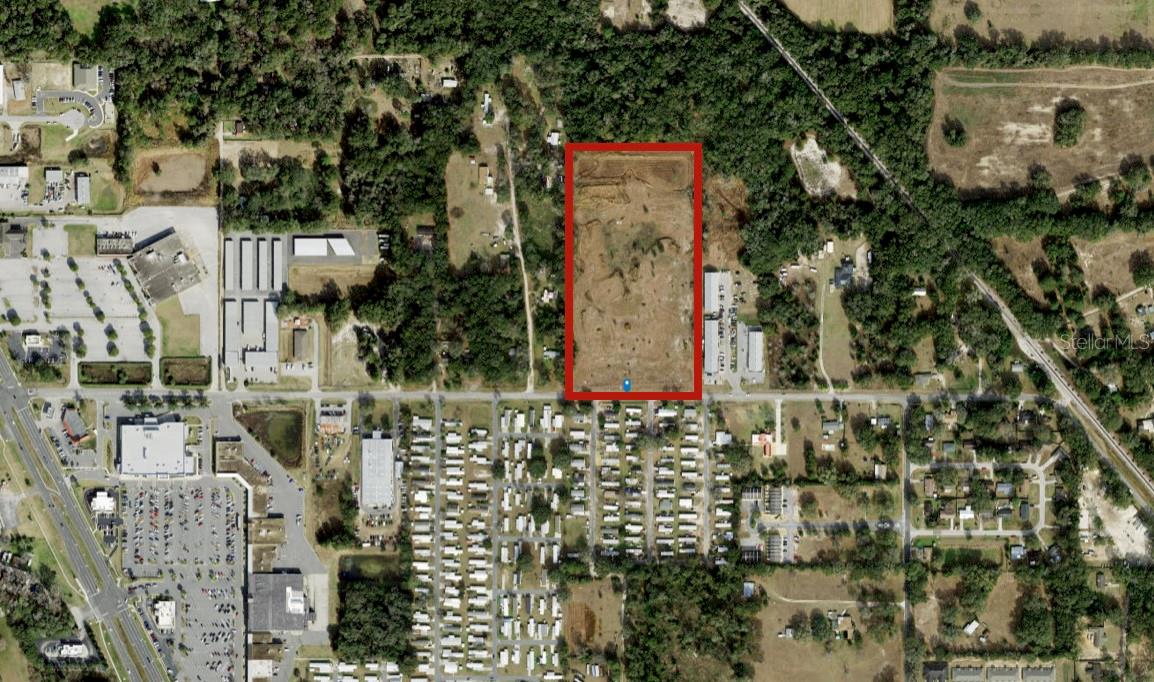 MULTIFAMILY DEVELOPMENT OPPORTUNITY. 15.43 Acres. Zoned R3, In City Limits of Belleview. 166 Units Multi-Family Apartments Project.OFFERING REPRESENTS 166 Unit Townhouse development with underground & lift station completed in 2005. Underground has been recently re-certified. Entitlements have been updated to original plans. 15.43 Acres located in City Limits of Belleview between The Villages and Ocala, convenient to new Publix, Schools, Retail & Restaurants. Although City addition of “Business District” in 2013 changed density to 124 units, P&Z is supportive of change to increase density back to 166 unit development as permitted in 2005-2010 for this development. Seller will allow time for needed modifications. Strategically positioned as one of the limited options to help fill the workforce rental supply void of the immediate area.Excellent Site Plan & Architectural Plans Available Include: 8 Apartment Buildings, Clubhouse & more.
