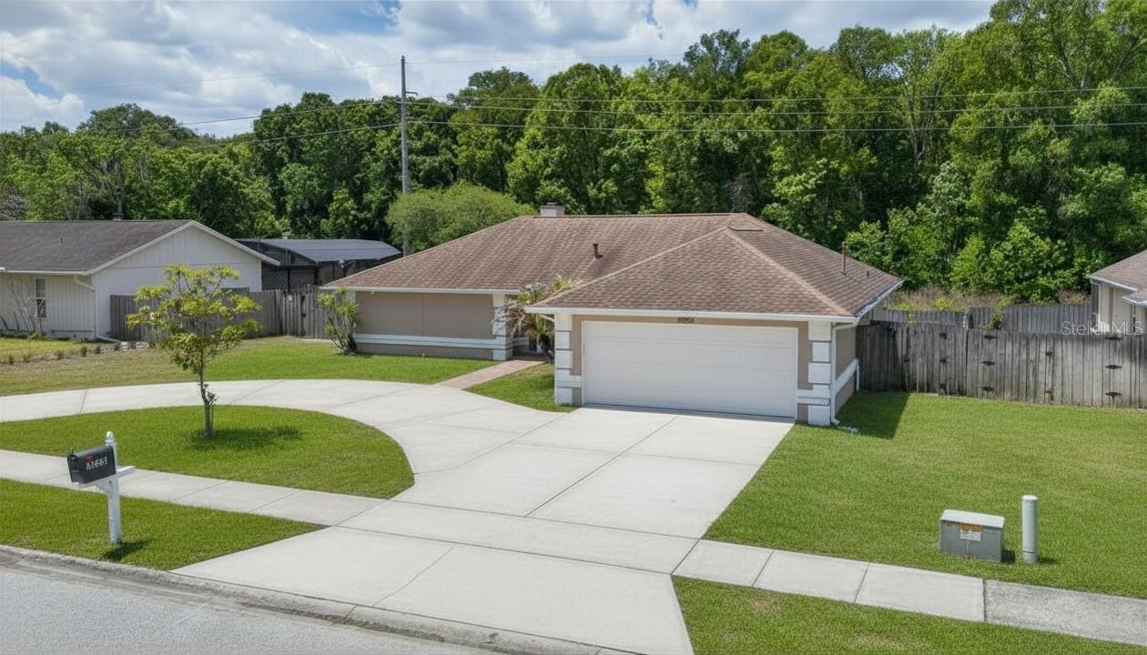 One or more photo(s) has been virtually staged. WELCOME-BIENVENIDO to HOWELL COVE! Beautiful 3-bedroom, 2-bathroom home located in the Seminole County area! This property features a NEW A/C (2026), fresh interior paint, and sits on a spacious 0.96-acre lot the property extends beyond the fence line and backs up to a conservation area and no rear neighbors, offering extra privacy, comfort, and peaceful views. 
The semi-circle driveway creates an elegant entrance while providing convenient easy-in/easy-out access without the need to reverse. As soon as you enter the home, you will notice the tile flooring throughout the entire house. The spacious living room features French doors leading to a screened patio and a huge deck overlooking the beautiful backyard.
The property extends beyond the fence line and backs up to a conservation area. The fully remodeled kitchen with wood cabinets is perfect for hosting amazing dinners with family and friends.
The garage has been freshly painted, including the floor.
Do you have an RV or boat? This home offers a dedicated side parking area with a concrete pad and an accessible fence gate for extra convenience. There is also a storage shed already waiting for you!
Don’t wait too long! Schedule your private showing or tour today.