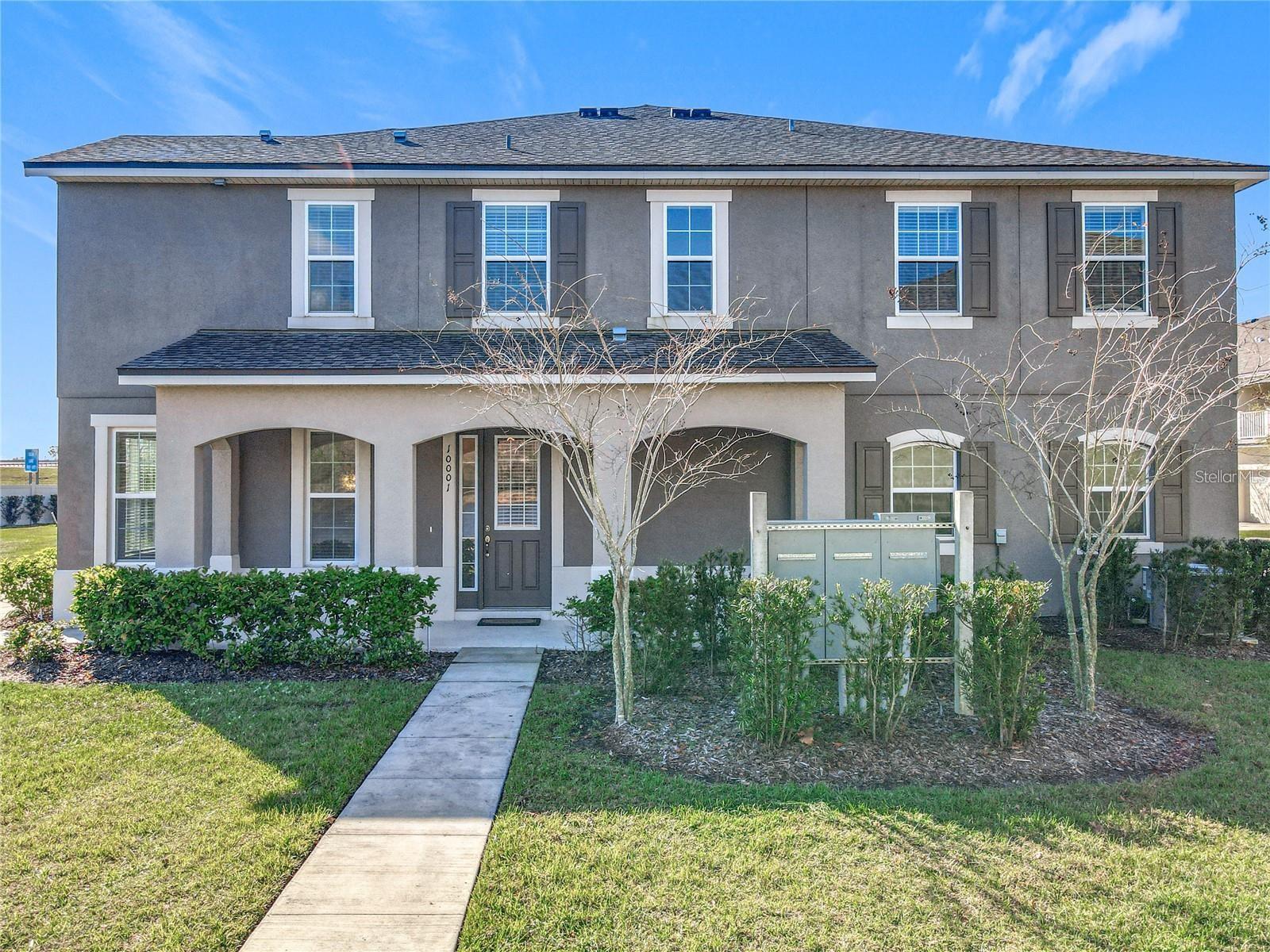 Rare end-unit townhome featuring a sought-after loft floor plan, a charming front porch overlooking the pond and pond views from every bedroom. Located in the gated community of Randal Walk, this bright and spacious 3-bedroom, 2.5-bath home offers a unique combination of indoor and outdoor living. As an end unit, the home benefits from additional windows that fill the space with natural light and create an open, airy feel throughout. Inside, the open-concept floor plan seamlessly connects the living room, dining area, and kitchen. Upstairs, a versatile loft provides valuable extra living space—perfect for a home office, media room, playroom, or study area—an advantage over many competing floor plans that offer a balcony instead of usable indoor space. The primary suite overlooks the pond and features a walk-in closet and ensuite bath with dual granite vanities. Additional features include luxury vinyl plank flooring throughout the main living areas, granite countertops in all bathrooms, a convenient second-floor laundry room with glass doors and storage cabinets, a drop zone near the garage entry, storage shelving in the two-car garage, and ample storage throughout the home. Ideally located in the heart of Lake Nona, just minutes from Medical City, Orlando Health ER, Lake Nona Town Center, USTA National Campus, Orlando International Airport, shopping, dining, major highways, and top-rated schools.