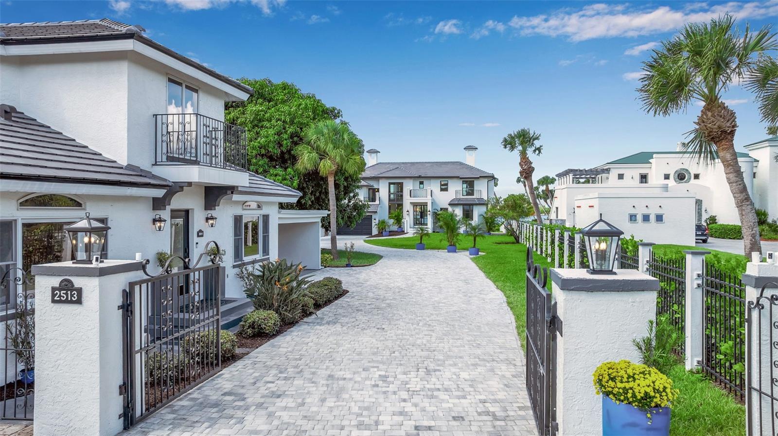 Newly Remodeled Waterfront Estate | 6 Beds | 5 Baths | Guest House | New Pool & Dock

Experience refined coastal luxury in this gated, totally redesigned waterfront estate offering breathtaking, unobstructed views of Blackburn Bay. The main residence features 4 bedrooms and 3 baths, complemented by a 2-bedroom, 2-bath guest house—fully turnkey and beautifully furnished, complete with full kitchen, laundry, and carport with workspace.  Main residence is approximately 4800 sq ft and the guest house is 1350 sq ft.

Every detail was thoughtfully curated throughout the redesign. The chef’s kitchen is a showpiece with Thermador premium appliances, 48-inch 6-burner range, custom range hood, two wine and beverage refrigerators, elegant banquette, and handmade tile backsplash.

Interior highlights include a soaring 20-foot stone fireplace wall, curved staircase with custom railings, and light oak flooring throughout. The home showcases handcrafted natural stone finishes—marble, dolomite, quartzite, and travertine—in every room.

Outdoors, enjoy resort-style living with a new 48-foot lap pool and spa, porcelain Tabby Oyster deck, lush landscaping, and a new 16,000-lb lift and dock with water, electric, and solar lighting—engineered for all tides and storms. Additional features include nine remote-controlled roll-down screens, a well-fed irrigation system, marine-grade exterior lighting, custom Kynar railings, and wood porch ceilings.

This extraordinary property blends timeless design, top-quality materials, and unmatched waterfront living—ideally located near the world-class dining, shopping, and culture of downtown Sarasota and the charming coastal town of Venice. The perfect spot to enjoy breathtaking sunsets over Casey Key.