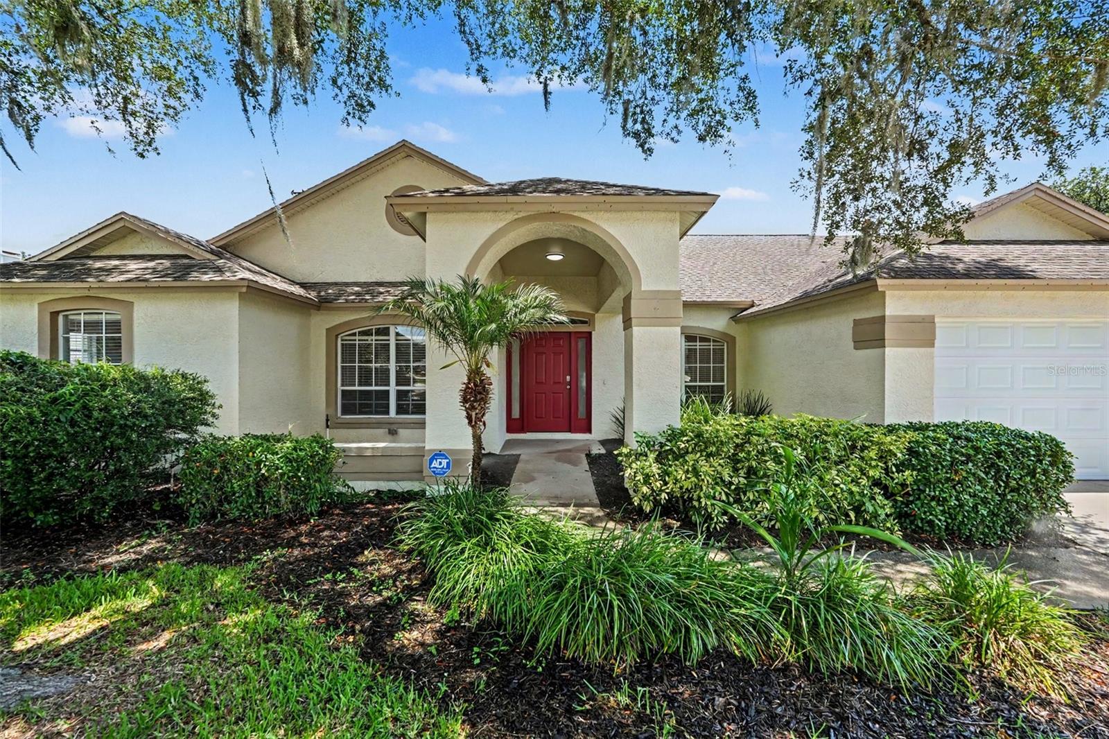 Virtually Staged. Welcome to the beautiful and desirable golf course community of Buckhorn, where residents enjoy a true sense of neighborhood charm. This home immediately impresses with exceptional curb appeal, featuring a lit front porch, manicured landscaping, and elegant exterior accents that set the tone from the moment you arrive. 
Step inside to discover a bright and airy open floor plan designed for modern living, with luxury vinyl plank, tile, and carpet flooring carried thoughtfully throughout the home. The kitchen is a standout with sleek stainless steel appliances, ample counter space, and a seamless flow into the main living areas — perfect for entertaining family and guests alike.
Retreat to the spacious master suite, complete with a dual vanity, a separate soaking tub, and a walk-in shower, offering a true spa-like experience right at home. Additional bedrooms provide generous space and flexibility for family, guests, or a home office.
Out back, your own private oasis awaits — a large screened-in pool and expansive patio create the ultimate Florida outdoor living experience, whether you're hosting a weekend cookout or unwinding after a long day.
With its prime location in Buckhorn, gorgeous upgrades throughout, and outstanding outdoor space, this home truly has it all.
