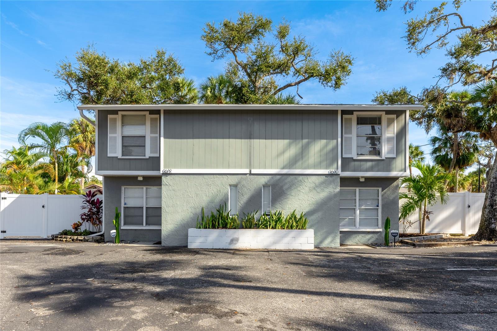 A compelling investment opportunity within Sarasota city limits and only one mile from Downtown. This side by side duplex features two matching 2 bedroom, 1.5 bath townhome style units that have been updated to attract quality tenants and support strong rental performance. Being located inside the city limits also allows weekly rentals if desired, giving investors valuable flexibility in their strategy. Each unit offers bright, modern interiors with durable tile flooring on the main level, upgraded kitchens with shaker cabinetry, stainless appliances, contemporary backsplash details, and clean finishes that keep future maintenance simple and predictable. The upstairs layout includes two comfortable bedrooms and a full bath, creating an efficient and easy to lease floor plan that works well for both long term and short term tenants. Both 1610 and 1612 enjoy fully fenced private backyards with one featuring a spacious grassy area with a dedicated patio setting, while the other includes a relaxed fire pit lounge framed by mature Florida trees. This separation gives each unit its own appeal and enhances the property’s overall appeal. Parking directly in front of each entrance adds another convenience tenants appreciate and owners benefit from. With no association fees, modern updates, low maintenance features, and strong demand in the surrounding area, this duplex performs well as a straightforward income producing asset. Investors can maximize returns across both units, while those seeking flexibility have the option to live on one side and lease the other. A turn key opportunity in a highly desirable location near parks, cultural venues, Sarasota’s waterfront, and the downtown core. **THIS PROPERTY QUALIFIES FOR A 1% LENDER INCENTIVE IF USING PREFERRED LENDER. INQUIRE FOR MORE DETAILS.**