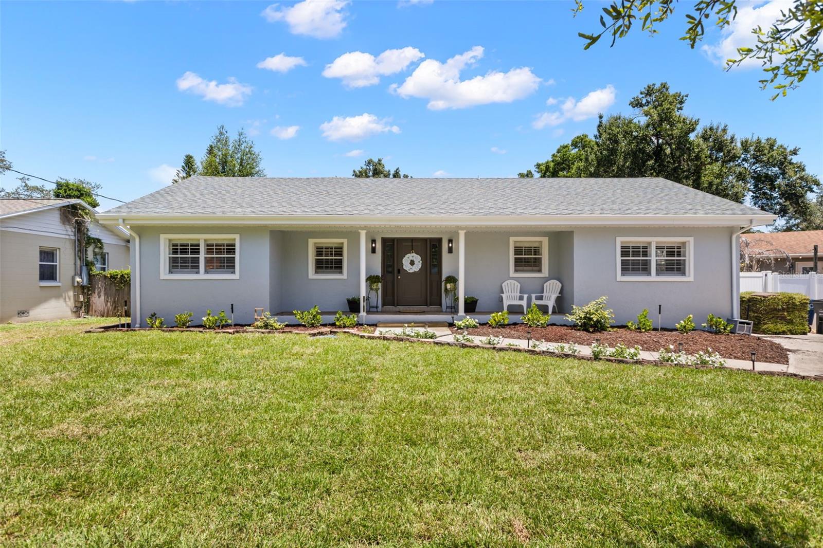 Rare Winter Park gem, nestled between Lake Baldwin and the heart of Winter Park. This fully refreshed, single-story home features brand-new interior and exterior paint, complemented by newly refreshed landscaping. Offering 3 bedrooms and 3 full bathrooms, the highly desirable split floor plan includes two primary suites. The main primary suite boasts an updated shower, vanity, and a spacious walk-in closet. The second suite features a garden tub with shower and its own walk-in closet. The updated kitchen is equipped with floor-to-ceiling cabinets for ample storage and a custom built-in kitchen nook with bench seating. Additional highlights include a cozy fireplace, laminate flooring, plantation shutters, an air-conditioned laundry room, and an incredible oversized 3-car garage. Enjoy Florida’s outdoor living year-round with a screened porch and a spacious, fully fenced backyard. Superb location under a half-mile to Baldwin Park, 2.5 miles to Park Avenue, and 3 miles to Rollins College. Zoned for highly rated Winter Park schools and situated just moments from the Lake Baldwin dog park.