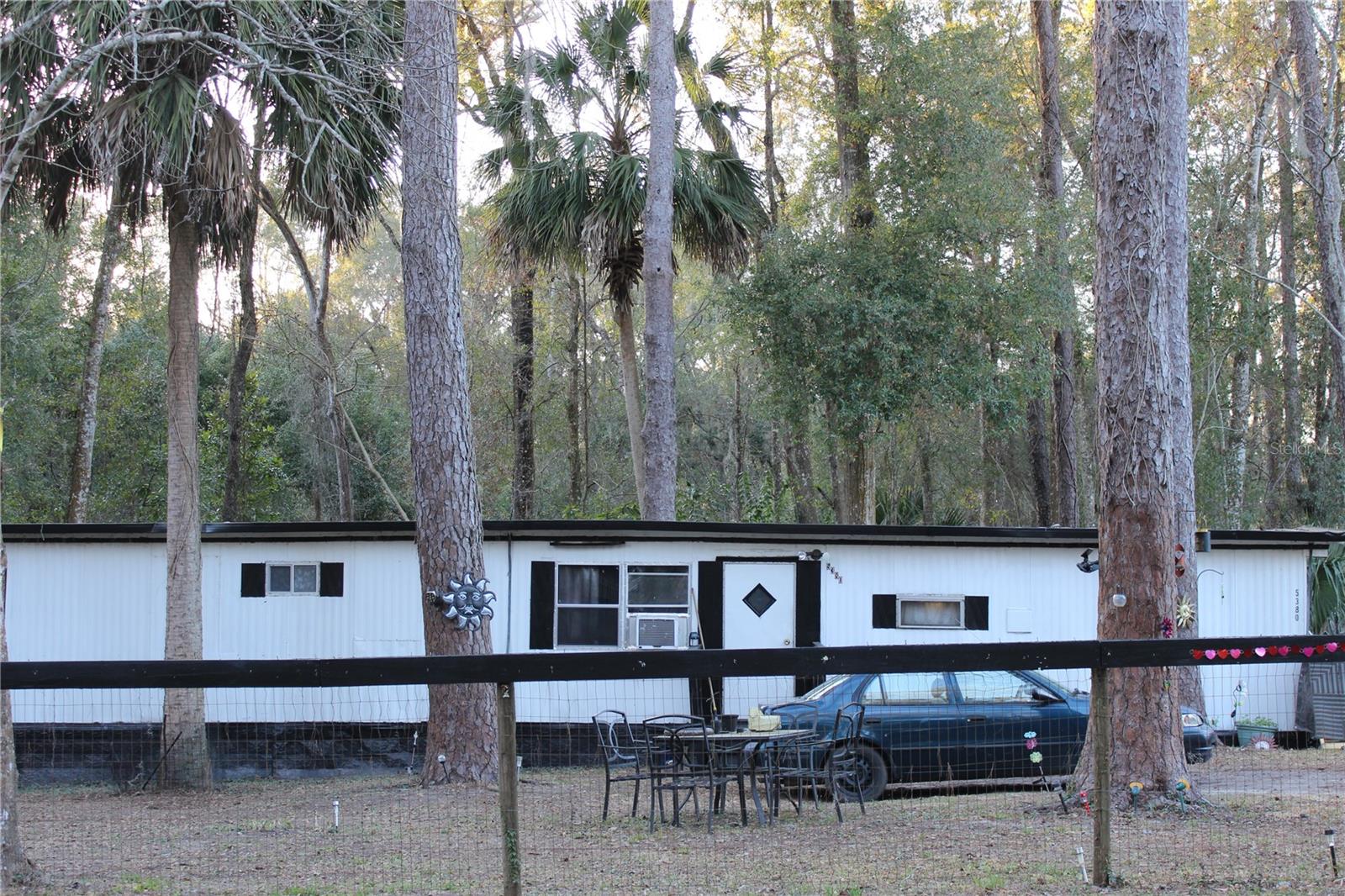 - PRICE IMPROVEMENT – NOW OFFERED AT $299,000

5380, 5420, 5431, & 5501 SE 28th Court, Ocala, FL

Significant price adjustment reflecting current market conditions. This assembled four-parcel income-producing portfolio is now offered at $299,000, creating an attractive entry point for investors seeking immediate cash flow and long-term upside in one of Central Florida's fastest-growing markets.

Exceptional opportunity to acquire four income-producing parcels (sold together – cannot be separated) in rapidly expanding Ocala. This offering is part of a larger 9-property investment portfolio and consists of tenant-occupied mobile homes with documented rental history and established cash flow. Income is in place from day one, allowing an investor to step into an operational asset with immediate returns.

With leases currently in place, the portfolio offers both short-term income continuity and long-term flexibility for future value enhancement at the buyer's discretion. Each parcel is individually positioned yet assembled to create scale, operational efficiency, and strategic leverage.

The properties provide workforce housing in a corridor experiencing strong population growth, infrastructure expansion, and sustained rental demand driven by in-migration and employment growth. Ocala continues to benefit from major corporate and regional investment, including distribution facilities developed by nationally recognized operators such as FedEx and AutoZone. The internationally recognized World Equestrian Center—the largest equestrian complex in the United States—generates year-round tourism, seasonal residency, and ongoing housing demand.

Strategic Central Florida Location:
• Approx. 75 miles to Orlando International Airport
• Approx. 1 hr 20 min to Daytona Beach
• Approx. 1 hr 30 min to Clearwater Beach
• Direct access to I-75 connecting Tampa, Orlando, and North Florida

This central positioning enhances tenant appeal while reinforcing long-term land value fundamentals.

Investment Highlights:
• Price recently reduced to reflect current market conditions
• Tenant-occupied with income in place
• Multi-parcel assemblage increases flexibility and scale
• Opportunity for phased improvements and rental optimization
• Attractive hold-and-enhance or long-term land-bank strategy (buyer to verify zoning and land-use options)

As Marion County continues to attract logistics, industrial, and tourism-related growth, assembled multi-parcel income opportunities remain limited. This portfolio provides immediate cash flow with built-in flexibility to execute a tailored improvement or redevelopment plan over time.

All parcels in this listing convey together. Serious investors should take note of this newly adjusted pricing and evaluate the opportunity promptly.

REF: TB8478427, TB8478180