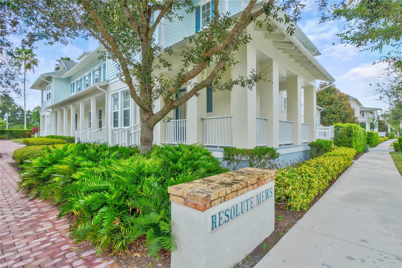 This Celebration townhouse is just stunning!  From the welcoming front porch to the oversized 2 car garage, this home has it all. This home is a 2 bedroom 2 1/2 bath, the loft can easily be converted to a 3rd bedroom if it's needed. The first floor has a spacious family room, large hall closet, dining area, half bath, and a gorgeous kitchen with a large island and lots of counter space and a brand-new dishwasher was just installed. As you walk up the newly carpeted stairs and 2nd floor, you will find the loft area and full bath for the 2nd bedroom and loft, the laundry closet (washer and dryer included) and then the primary bedroom with its great closet and beautiful en suite. And no worries on utility costs with this home that was built with a radiant barrier, double pane windows and an energy efficient HVAC system. The storage in this townhouse is really well thought out, and always needed! This community has terrific shopping, restaurants, events, parks, ponds, lakes, and so much more, truly living in Main St USA!  The fees include all of the amenities, community pool, clubhouse, fitness center, park and the exterior maintenance of the lawn and landscaping, exterior paint, roofs, so no worries about large expenses, just enjoy living life to its fullest in this beautiful home located in a community with endless amenities, Disney Parks right next door, beaches on the East coast an hour away, West coast, 90 minutes! Truly live the dream here in Celebration. OWNER IS MOTIVATED
