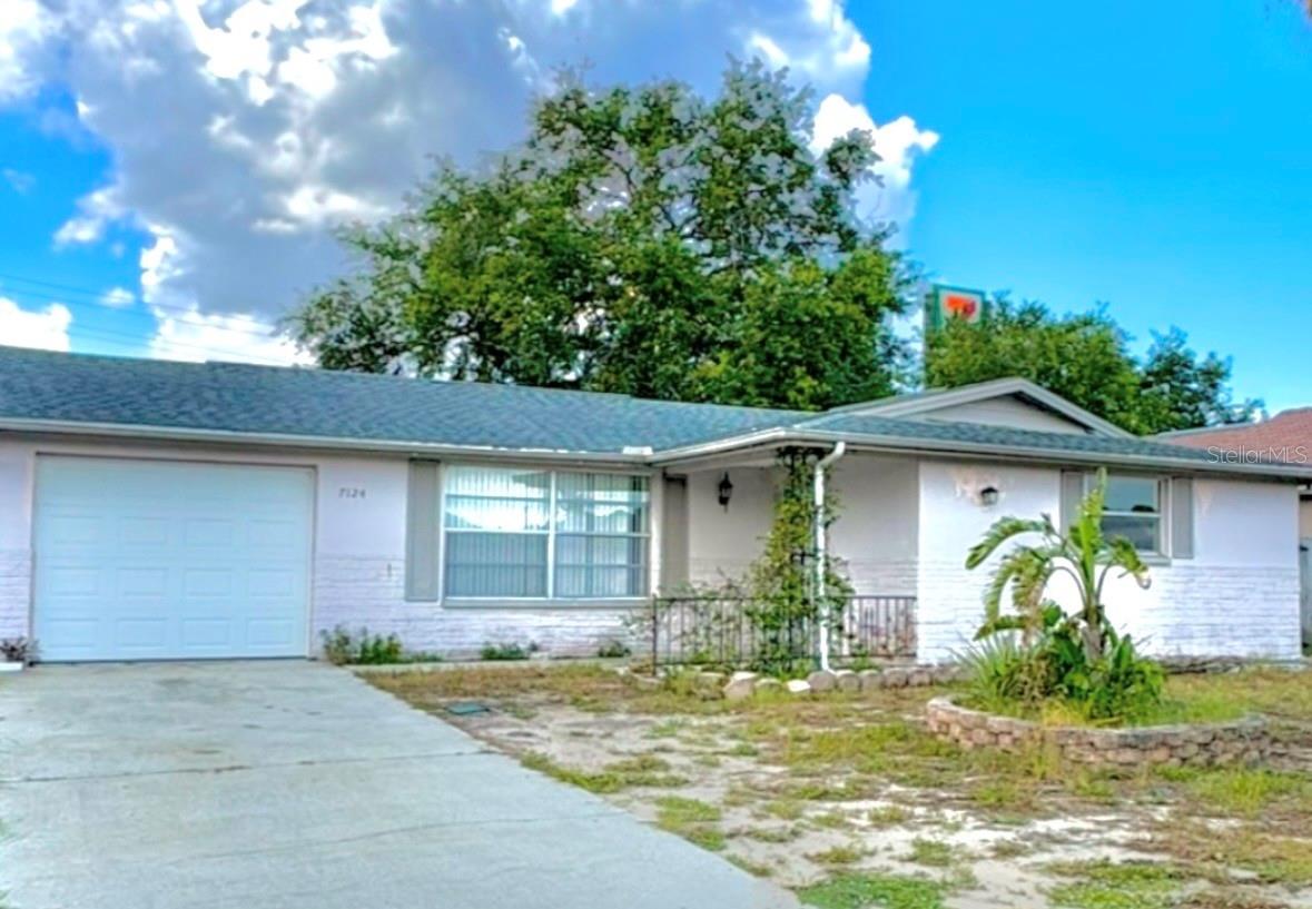 2-bedroom, 2-bath single-family home with an attached garage, a spacious yard, and a screened-in lanai perfect for relaxing or entertaining. This home offers comfortable living with plenty of outdoor space to enjoy. Conveniently located near shopping, dining, schools, and major roadways.