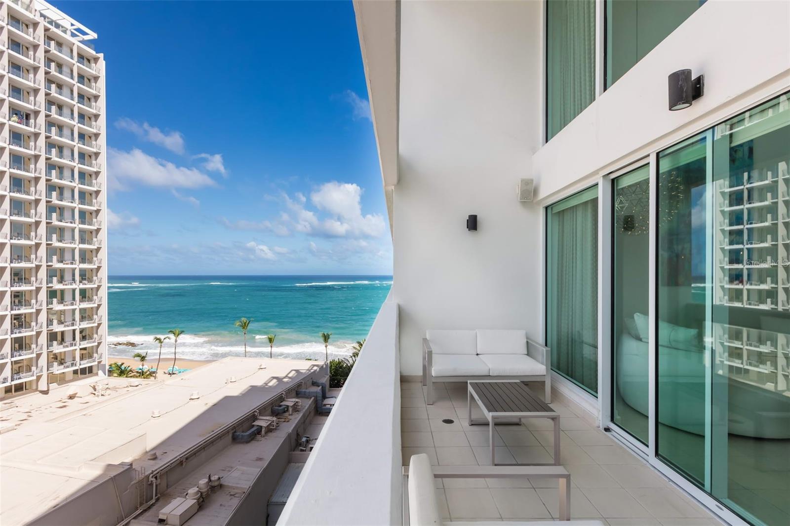 This recently remodeled 2,888 sqft apartment has three bedrooms with en-suite bathrooms, a fourth full bath, entertainment room, office, laundry, an open concept living, dining and kitchen area, and a balcony. The property is fully furnished and equipped, and includes three covered parking spaces right by the elevator, plus a storage closet.

Step into the grandeur of this recently remodeled two-story residence overlooking Condado Beach and its city profile from the ninth floor of the modern and luxurious Aquamarina condominium.  

As you enter this magnificent dwelling you are welcomed by its open and bright space that integrates the living, dining and chef’s cuisine areas with the right balance; garnished by double-height ceiling and glass window walls. The contiguous balcony invites to look out and enjoy the astonishing ocean caressing the sandy beach; and sunsets that will take your breath away. 

This apartment comes thoroughly equipped and move-in ready. The spacious master bedroom and its generous en-suite bathroom - featuring jacuzzi bathtub and shower - are complemented by a his walk-in closet and hers walk-in small room that will surely suit your needs.

Indulge in the luxurious amenities exclusively for Acquamarina residents’ enjoyment: pool area with open terrace, fitness room with sauna and steam-room, activity room, direct access to Condado beach, 24/7 security, full back up generator and water cistern. Conveniently located within steps of two of the top private schools, hospitals, fine dining restaurants, hotels and other places of interest.

Dare to be impressed. Experience the ultimate lifestyle, location and luxury at Acquamarina! Become a resident at Acquamarina and be part of the excitement!!!

For your convenience, Acquamarina has 24 hour security, full power generator and water cistern.

BUILDING INFORMATION
Built: 2008 # Stories: 15 # Units: 47 # Elevators: 4 Guest Parking Spaces: 8 24/7 Security Full Backup Generator Water Cistern Pool Gym Direct Access to the Beach