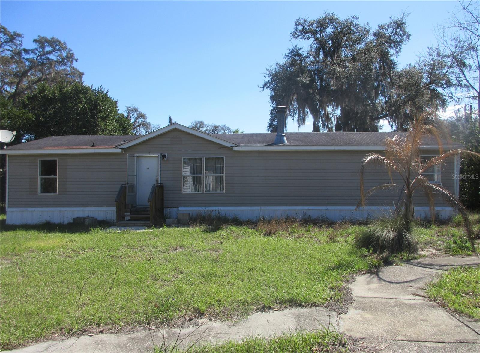 INVESTORS ALERT! 2000 DOUBLEWIDE 3 BEDROOM 2 BATH WITH 1344 SQ FT. MOBILE HOME HAS NEW PAINT, CABINETS, APPLIANCES, TILE FLOOR, AND STARTED REHAB. ALSO INCLUDED AND SECOND DWEELING THAT IS 1 BEDROOM 1 BATH COULD MAKE FOR A GREAT RENTAL OR ROOM FOR YOUR EXTENDED FAMILY. ALSO IS A 20X30 2 CAR GARAGE. HOMES NEED TO BE FINISHED FOR A GREAT RETURN. PRICED FOR A QUICK SALE. SCHEDULE YOUR SHOWING ASAP!
