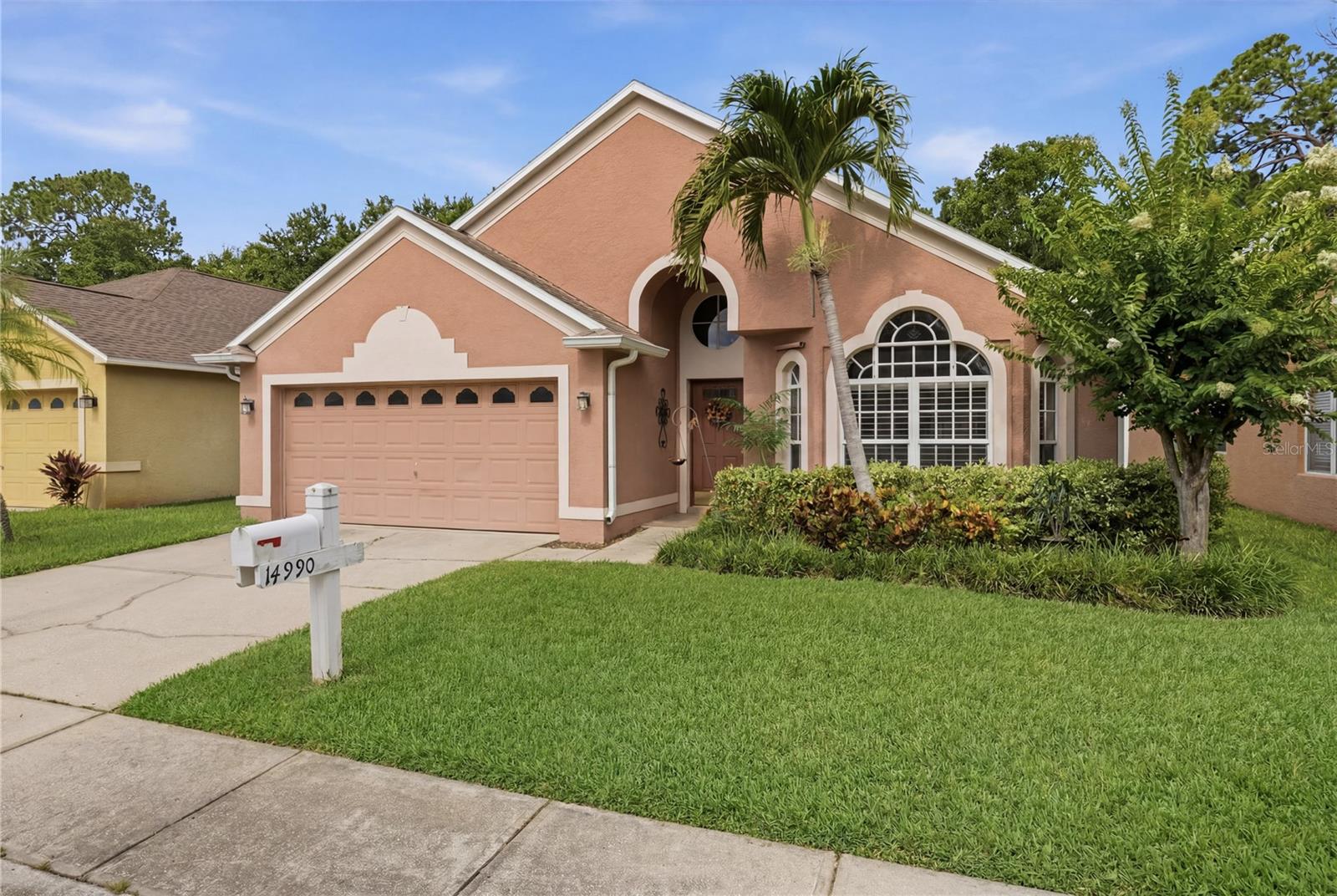 Welcome to your 3 bedroom, 2 bath, pool home! Featuring an open floor plan and split room layout with abundant natural light. As you walk in, pass by the foyer and dedicated dining room, and into the main living room with half-round skylight illuminating the home. The kitchen is located just off the living room, and includes a convenient breakfast nook. The primary bedroom is separated from the two additional rooms, and features a walk-in closet and dual-vanity shower and bath combo. Outside, a heated screened in pool sits next to a shaded pergola. Additional features include custom metal storm shutters, and SOLAR PANELS to power your home with Florida’s rays.