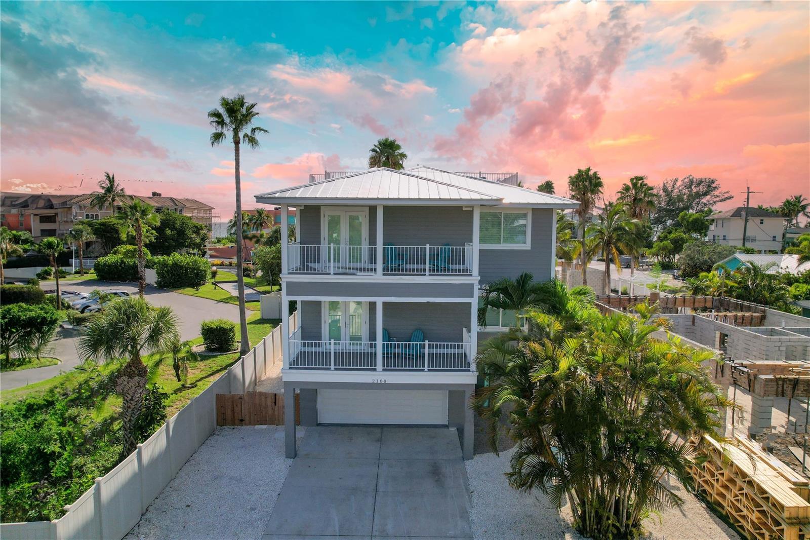Welcome to the “Grand Island Oasis”, a luxury and spacious 8 bedroom/5 bath home, located minutes from the white sands of Anna Maria Island. 
This home comes with its own heated pool, spa, game room, giant entertainment kitchen and an enchanting large rooftop terrace with 360 degree views stretching from the  beach to the bay, making it a perfect second home or investment property.

This contemporary and elegant custom-built home sleeps 18 and is perfect for any gathering, whether it is a family reunion or wedding, The Grand Island Oasis has an abundance of natural light with a very warm and inviting beach at atmosphere. 
Walk to the restaurants, shops and beach or enjoy the day at the pool, this home has it all. 

The Grand Island Oasis is listed below the recent appraisal and comes with instant income. 2023 rentals totaled $238K, with $170K in 2024 reservations. Arrange your private showing today.