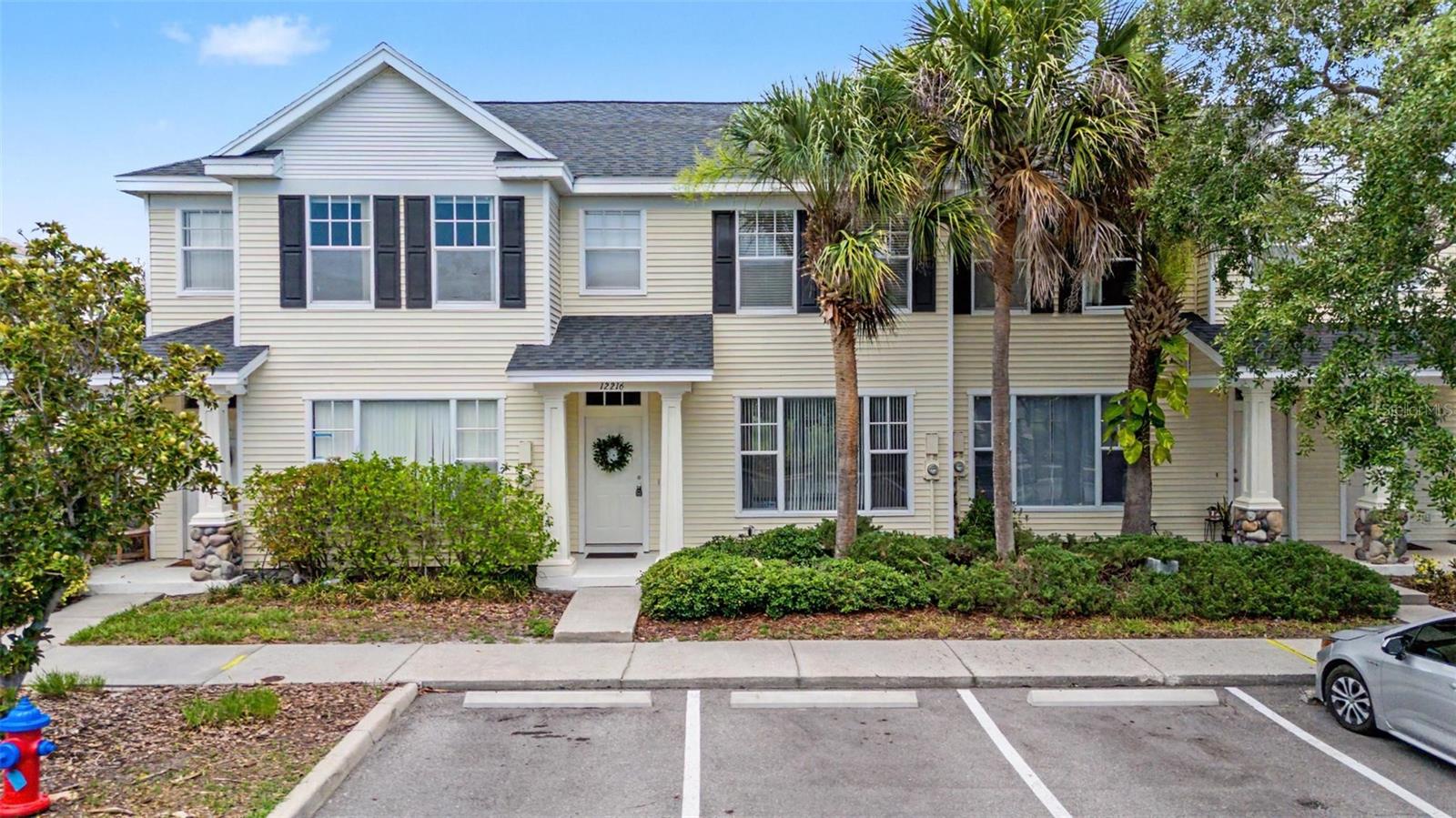 Welcome to this beautifully refreshed, move-in-ready 2-bedroom, 1.5-bath townhome in the highly desirable Country Chase community, offering maintenance-free living in one of Tampa's most sought-after locations near Westchase. Combining modern improvements, peaceful pond views, and an unbeatable location, this home is perfect for first-time homebuyers, seasonal residents, downsizers, or anyone seeking low-maintenance Florida living.

Fresh interior paint, updated lighting and fixtures, brand-new upstairs carpeting in bedrooms, and durable laminate flooring throughout the first floor create a bright, inviting interior that's ready for immediate enjoyment. The refreshed kitchen features a new range, new dishwasher, abundant cabinet space, and a functional layout that flows effortlessly into the dining and living areas, making everyday living and entertaining easy.

Upstairs, you'll find two generously sized bedrooms with excellent closet space, a full bathroom, and a conveniently located laundry area, while the first-floor half bath provides added convenience for family and guests.

Enjoy added peace of mind with significant capital improvements already completed, including a new A/C (2025) and roof (2021), allowing you to focus on enjoying your new home instead of costly future maintenance.

Step outside to your private screened lanai overlooking a tranquil pond, creating the perfect setting to enjoy your morning coffee, unwind after work, or entertain while taking in peaceful waterfront views.

Residents of Country Chase enjoy maintenance-free living and access to a community swimming pool, basketball court, and playground- while being just minutes from Westchase, Citrus Park Mall, Veterans Expressway (SR 589), Tampa International Airport, downtown Tampa, top-rated schools, shopping, dining, parks, golf courses, and countless entertainment options. This exceptional location provides quick access to everything the Tampa Bay area has to offer while maintaining the quiet charm of an established community.

Whether you're searching for a primary residence, a seasonal retreat, or an excellent investment opportunity, this beautifully refreshed townhome delivers outstanding value, comfort, and convenience.

Schedule your private showing today and experience everything this exceptional home has to offer!