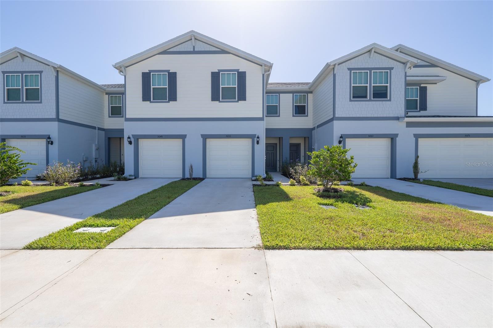 2025-Built Modern Townhome in Sunrise Estates! The first-floor offers high ceilings, recessed LEDs, LVP flooring and plenty of natural light. The open concept includes a spacious great room with sliders to a relaxing covered lanai, perfect for enjoying pond and wildlife views. The kitchen is a chef's delight boasting Whirlpool stainless steel appliances, quartz countertops, breakfast bar, tile backsplash, and contemporary cabinetry. The upstairs primary suite features a generous walk-in closet, plush carpet and a spa-like en suite bath with 18'' ceramic tile flooring, walk-in shower and dual vanity. Energy-efficient HVAC, smart thermostat, hot water heater, impact doors/windows offer peace of mind. A convenient in-unit laundry and attached 1-car garage round out this move-in-ready home. Welcome to the Space Coast's newest gated community with a LOW HOA fee, lush grounds, and a resort-style pool and cabana, minutes from I-95, shopping, dining, and easy access to Orlando and the beaches!