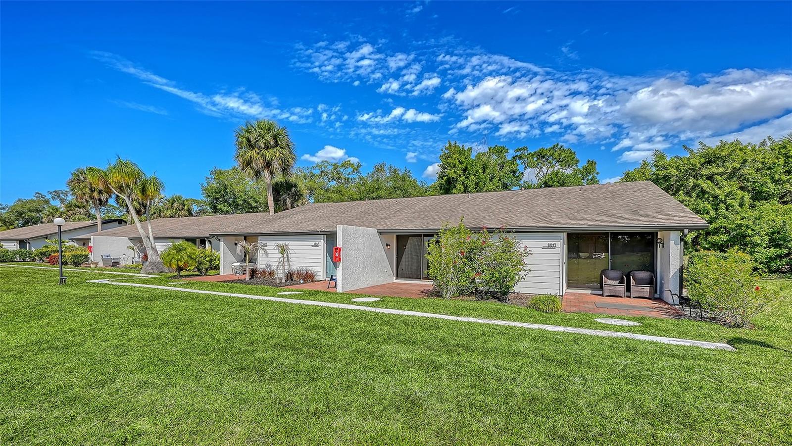Location, views and value! Enjoy fabulous golf course views from this easy-living villa in The Meadows, one of Sarasota's sought-after neighborhoods, just 15 minutes from downtown. A canopied street and a private brick patio welcome you home. Inside you will love the tranquil ambiance enhanced by natural light, oversized luxury vinyl plank wood-look flooring, freshly painted interior and practical layout. Enjoy morning coffee and relax at the end of the day on the charming front patio showcasing fabulous golf course views. All with no one above or below you, just 250 feet to the heated pool with a grilling patio and adjacent to all the fun The Meadows has to offer. Set on 1,600 park-like acres, The Meadows is a resort-style community just 15 minutes from downtown. Enjoy 14 miles of scenic trails and an available fitness center, junior Olympic pool, pickleball, golf and Har-Tru tennis. You’ll be minutes from award-winning beaches, vibrant arts and culture, Whole Foods, Trader Joe’s, Nathan Benderson Park, Mote SEA Aquarium, the future Sarasota Orchestra and Legacy Trail and University Town Center, a favorite shopping, entertainment and dining destination. There is room for a stackable washer and dryer in the foyer closet. Above the floodplain in Zone X.