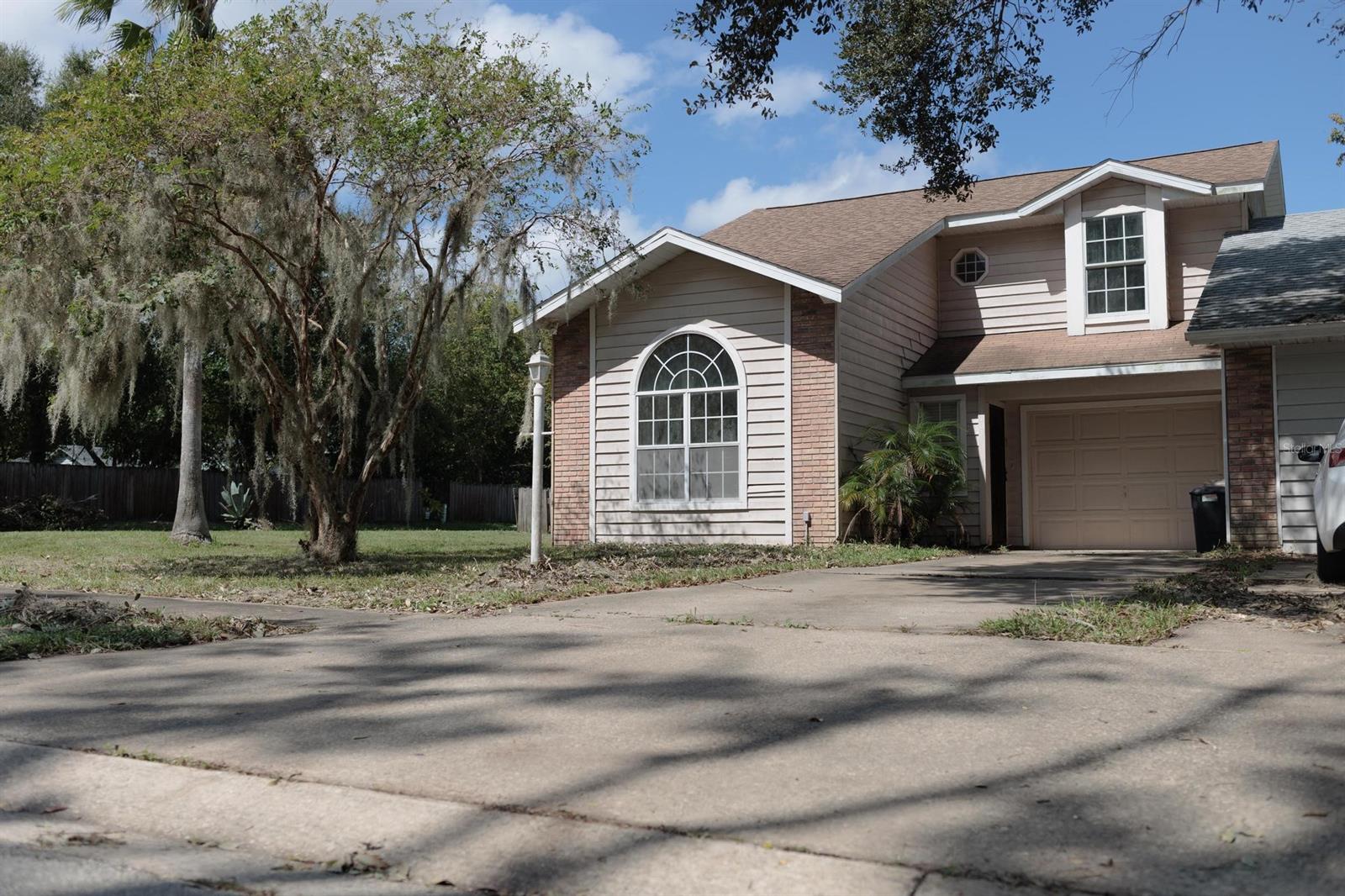 This adorable 3 bedroom 2.5 bathroom end unit townhome is located in a very private but convenient part of Port Orange with NO HOA!! Situated on a huge corner lot this 2 story home boasts massive ceilings and open concept. Downstairs has a spacious living room that looks into the quaint kitchen. There is also a bedroom and half bath room located on the first floor. Upstairs has two more bedrooms each with an attached bathroom and walk in closet. This cute home is just waiting for you to move in! Schedule a showing with me today! All measurements to be verified by the buyer. ;Water: City