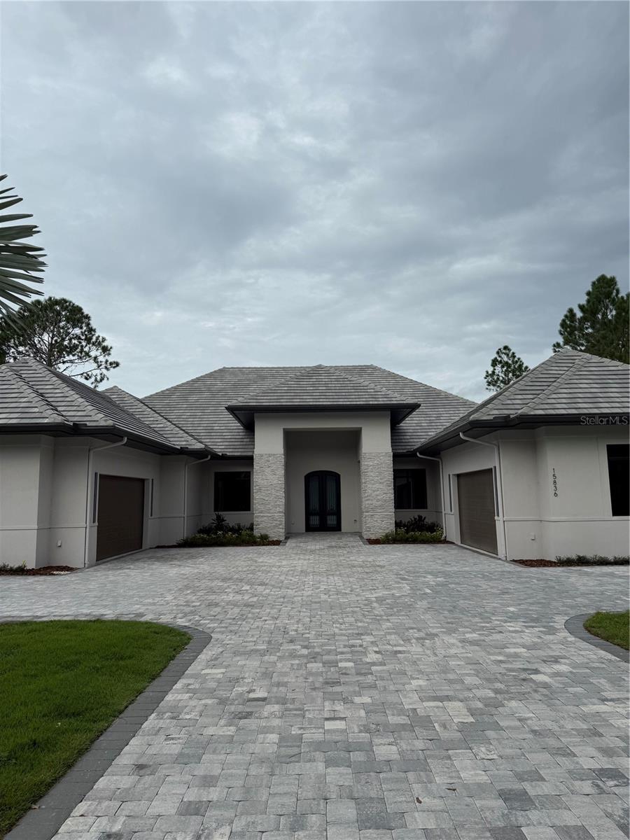 This custom Davila Homes masterpiece at 15836 Pendio Dr is more than just a home—it’s a curated experience. With soaring tray ceilings, elegant chandeliers, polished porcelain tile floors, and a chef’s kitchen designed for both beauty and function, every detail has been thoughtfully chosen to elevate modern living.

This beautiful contemporary move-in ready, custom-built, and upgraded home in the esteemed gated community of Bella Collina, was
professionally and impeccably designed. This home offers a blend of sophistication and functionality.This stately home’s light-filled, expansive
open living space and stylish interiors feature high ceilings, porcelain tile, open-style kitchen with custom upgrades throughout. The gourmet kitchen boasts sleek, custom cabinetry, and stainless steel appliances. The fully upgraded primary bathroom has an oversized primary shower, double vanities, and a luxurious tub. The luxurious primary bedroom suite is spacious and offers picturesque views of the forest-like
backyard. The driveway enhances both aesthetics and functionality. The Club at Bella Collina amenities include Har Tru tennis courts, outdoor pool complex, fitness center, pickleball, Nick Faldo designed 18-hole championship golf course, spa, complimentary fitness classes along with year-round social and culinary events.
