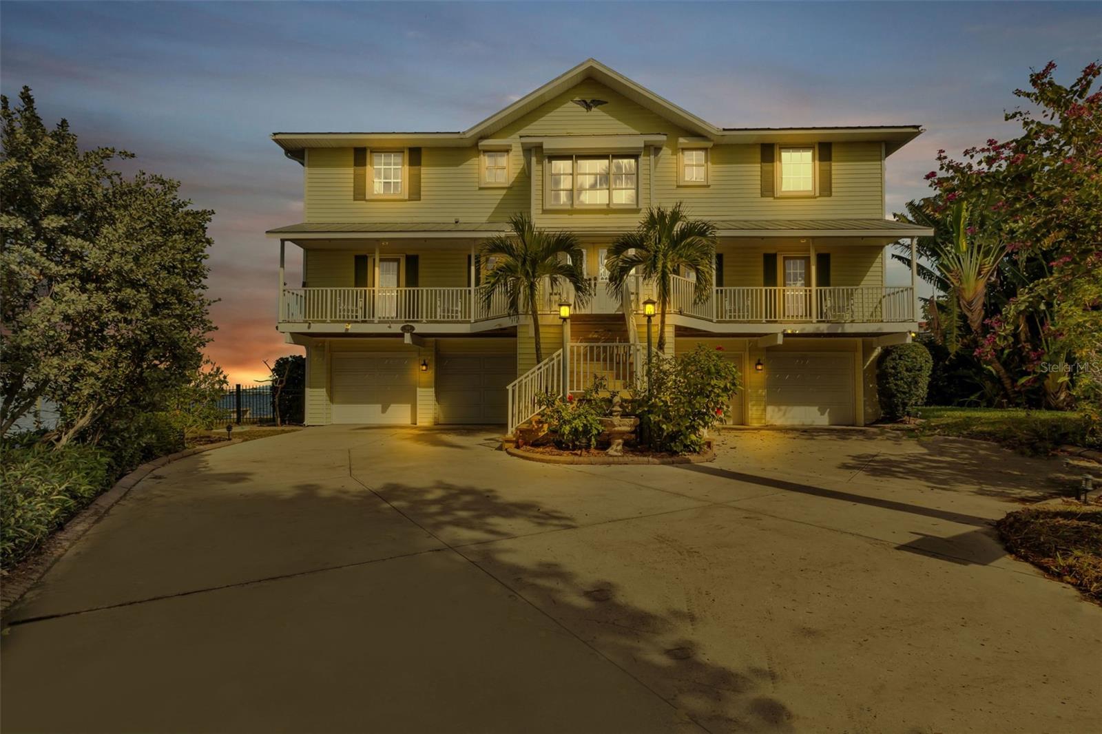 Enjoy the stunning views of the Peace River in Punta Gorda from this unique waterfront property.  You can watch dolphins, jet skiers and anglers from your backyard. The fenced backyard has an irrigation system. a dock and a 10,000-pound lift which is equipped with water and electricity. The inground saltwater pool is heated and has a new pump and salt cell. You have a feeling of a never ending vacation as you enjoy the spacious poolside lounge which features a built-in bar and offers stunning views of the water.  It's the perfect place to enjoy the annual July 4th fireworks celebration.  There are ample garage parking spaces, a workshop and plenty of storage.  The elevator, refurbished in 2021, connects all three floors.  The second floor features the main living areas, including a formal dining room with water views.  The grand living room has soaring ceilings with 18-foot-high windows overlooking the river.  The kitchen has been updated with granite counters and newer appliances.  The kitchen dining area provides a sweeping view that is reminiscent of a cruise ship!  You have sunset dinner reservations every evening!  The office has a scenic view of the water.  You may forget you are working!  The mother-in-law suite, with galley style kitchen, spacious bedroom and large living area,  is currently used as a game room with a pool table and memorabilia.  The screened back porch runs the entire length of the house and is a wonderful gathering spot for friends and family.  Take the stairs or the elevator to the third floor where you will find two large guest bedrooms and a shared bath.  One of the guest rooms boasts a sleeping porch overlooking the river. It's the perfect private getaway for your guests. The spacious primary bedroom is an en suite on the third floor. This grand bedroom allows you to fall asleep to the dancing lights on the water and wake up to a gorgeous wide river view. Next door to the primary suite you will find a quiet library overlooking the tranquil side garden; the perfect place to curl up with a good book! That adds up to a total of four bedrooms plus an office and a separate library!  The house has electric and roll down hurricane shutters and an LP gas whole house generator with two 190-gallon propane tanks. 3 AC units with separate wifi connected controls for the three living areas allow temperature adjustments where you need them and provide the convenience of adjustment when you are away from home. All of this is under a metal roof that was created to stand the test of time and weather. This property is secluded and private, but only five minutes away from historic downtown Punta Gorda; offering easy access to shopping, dining, waterfront parks, walking and bike trails, art galleries, weekend farmer's market, events, and more. The new Sunseeker Resort is just over the bridge in Port Charlotte.  This is a rare opportunity to enjoy waterfront living at its best and the seller is motivated to sell!