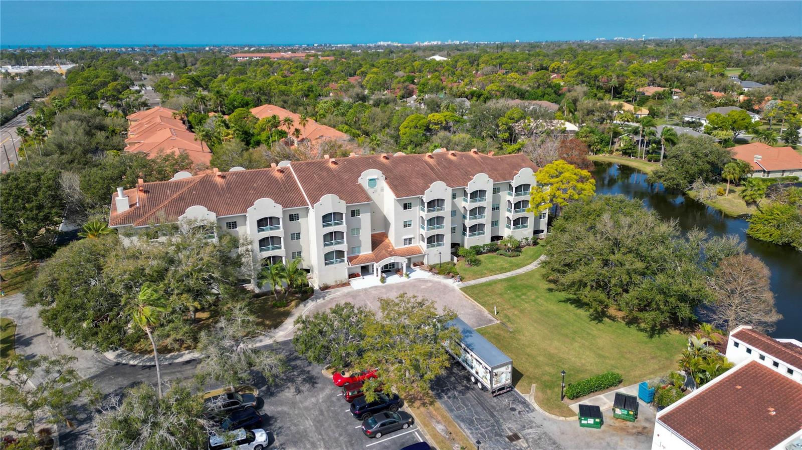 Welcome to this this exceptional 1,514 sq. ft. condo, one of the largest floor plans in the community! This spacious residence features 2 bedrooms, 2 full bathrooms, and a convenient half bath, along with a bright open living and dining area perfect for entertaining. Large windows provide abundant natural light and showcase peaceful pond views, creating a relaxing atmosphere throughout the home.

Ideally located just a short drive from Sarasota’s stunning Gulf beaches, this property offers easy access to shopping, dining, and local attractions. It’s also conveniently close to the Sarasota Square redevelopment, an exciting new mixed-use lifestyle destination planned to include a Whole Foods Market, popular restaurants, retail shops, and residential spaces, adding even more value and convenience to the area.

Whether you're looking for a primary residence, seasonal retreat, or investment opportunity, this spacious condo offers comfort, location, and lifestyle.

Schedule your showing today!
