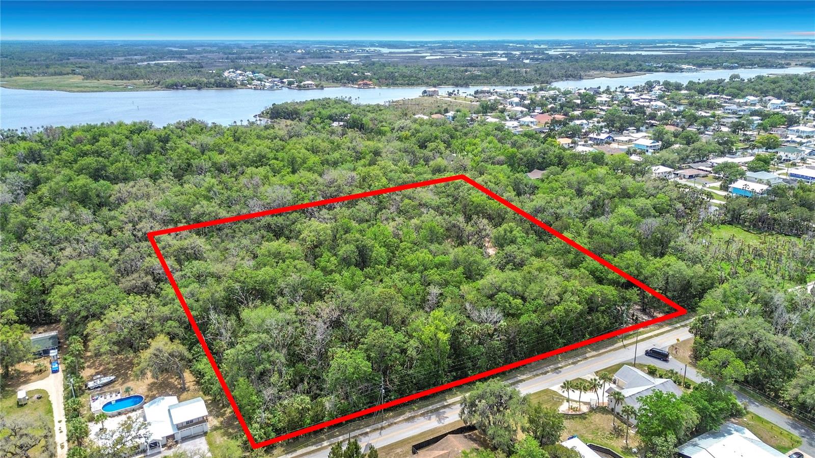 Build your dream home on this incredible 3+ acre homesite in the heart of Florida’s Nature Coast! Tucked away in a peaceful setting, this property backs up to state forest land, offering privacy, natural beauty, and that true “Old Florida” feel buyers are always chasing. Enjoy easy access to the Crystal River with a community boat ramp just a block away—perfect for getting out on the water in minutes. Optional Woodland Estates membership provides access to the private boat ramp for a low annual fee, making this an ideal spot for boating, fishing, and exploring the area’s famous springs. Conveniently located just off Suncoast Blvd, you’re only a short drive to Crystal River’s local restaurants, shops, and year-round events. Spend your days swimming with the manatees, scalloping in the Gulf, or simply soaking in the laid-back waterfront lifestyle. Opportunities like this don’t come around often—secure your slice of the Nature Coast and start building the life you’ve been dreaming about.