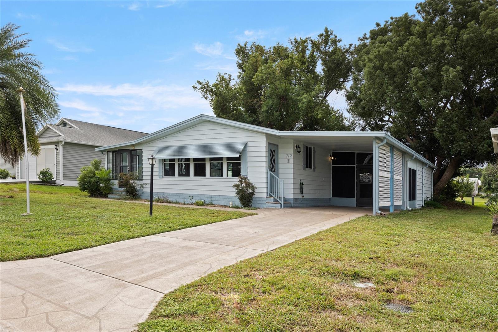 Welcome to the Historic Heart of The Villages!
Discover the charm and convenience of classic Villages living at 712 Jason Dr, perfectly situated in Orange Blossom Gardens, the highly coveted,  Historic District of this renowned 55+ community. This unique location offers a wonderful blend of tranquil, established neighborhoods with easy access to all the modern amenities The Villages is famous for. Experience the nostalgic allure of the first-ever homes built here, knowing you're right in the vibrant heart of the community's storied beginnings.
This delightful residence has been meticulously updated from top to bottom, offering you a worry-free move and years of comfortable living. Step inside and be greeted by a bright, open floor plan featuring stunning BRAND-NEW FLOORING that flows seamlessly throughout the home.
The home boasts an array of significant and high-quality upgrades. The KITCHEN has been completely REMODELED, now featuring sleek countertops, stylish cabinetry, and all NEW STAINLESS STEEL APPLIANCES, making it a chef’s dream and a perfect spot for entertaining. Both BATHROOMS have also been REMODELED, showcasing modern fixtures and attention to detail.
Critical infrastructure updates ensure peace of mind: The home is protected by a BRAND-NEW ROOF, and the entire exterior and interior boast FRESH PAINT, giving the home a crisp, inviting curb appeal and a move-in-ready finish. Other upgrades include NEW LIGHT FIXTURES and a NEW AIR CONDITIONER for optimal climate control. The spacious layout is designed for both relaxation and lively gatherings, bathed in natural light that highlights the beautiful finishes. For even more natural light, step out onto your ENCLOSED TILED LANAI and enjoy the Florida sun.
The Villages is not just a place to live—it's a vibrant, resort-style lifestyle. Residents of Orange Blossom Gardens enjoy immediate access to a wealth of activities. With over 3,000 organized clubs and countless activities, there is truly something for every interest. Enjoy championship and executive GOLF COURSES, dozens of RECREATIONAL CENTERS, SWIMMING POOLS, state-of-the-art FITNESS FACILITIES, and miles of picturesque multi-modal paths.
From this central location, you are just a short golf cart ride away from a vast array of dining options, unique shopping experiences, and top-rated healthcare facilities. The focus here is on creating a welcoming, active environment for active adults seeking both adventure and relaxation in their golden years.
Don't miss the opportunity to own a piece of The Villages' history with the luxury and comfort of a fully updated home!