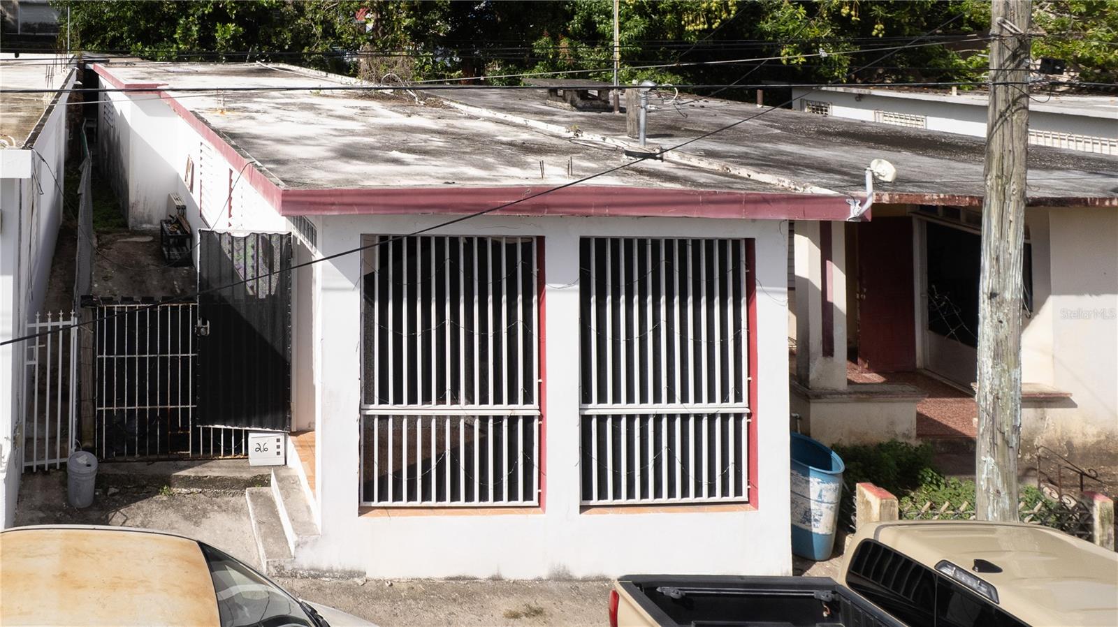 Tucked into a quiet street in the heart of Isabel II, the vibrant capital of Vieques, this delightful casita offers the perfect blend of convenience, character, and island ease. With the ferry, local shops, and a variety of restaurants, all within a 5min walk, the location makes car-free living not only possible, but enjoyable.

This one-bedroom, one-bath home is thoughtfully laid out and in excellent structural condition, making it an residence, vacation retreat, or even a small gallery or boutique business with just a little TLC. The inviting front porch and private back terrace offer space for outdoor dining, lounging, or cultivating a small herb or vegetable garden.  There is also potential to expand upward, with possibilities for a future second floor or rooftop terrace.

From your doorstep, walk to one of the best pizza spots in town, unwind at a laid-back seaside bar known for its great burgers, or enjoy fresh local seafood just minutes away. Seaglass Beach is also within a 7min walk, adding to the home’s appeal for those who love the ocean lifestyle.

With minimal maintenance and everything you need close at hand, this property is perfectly suited for easy island living!