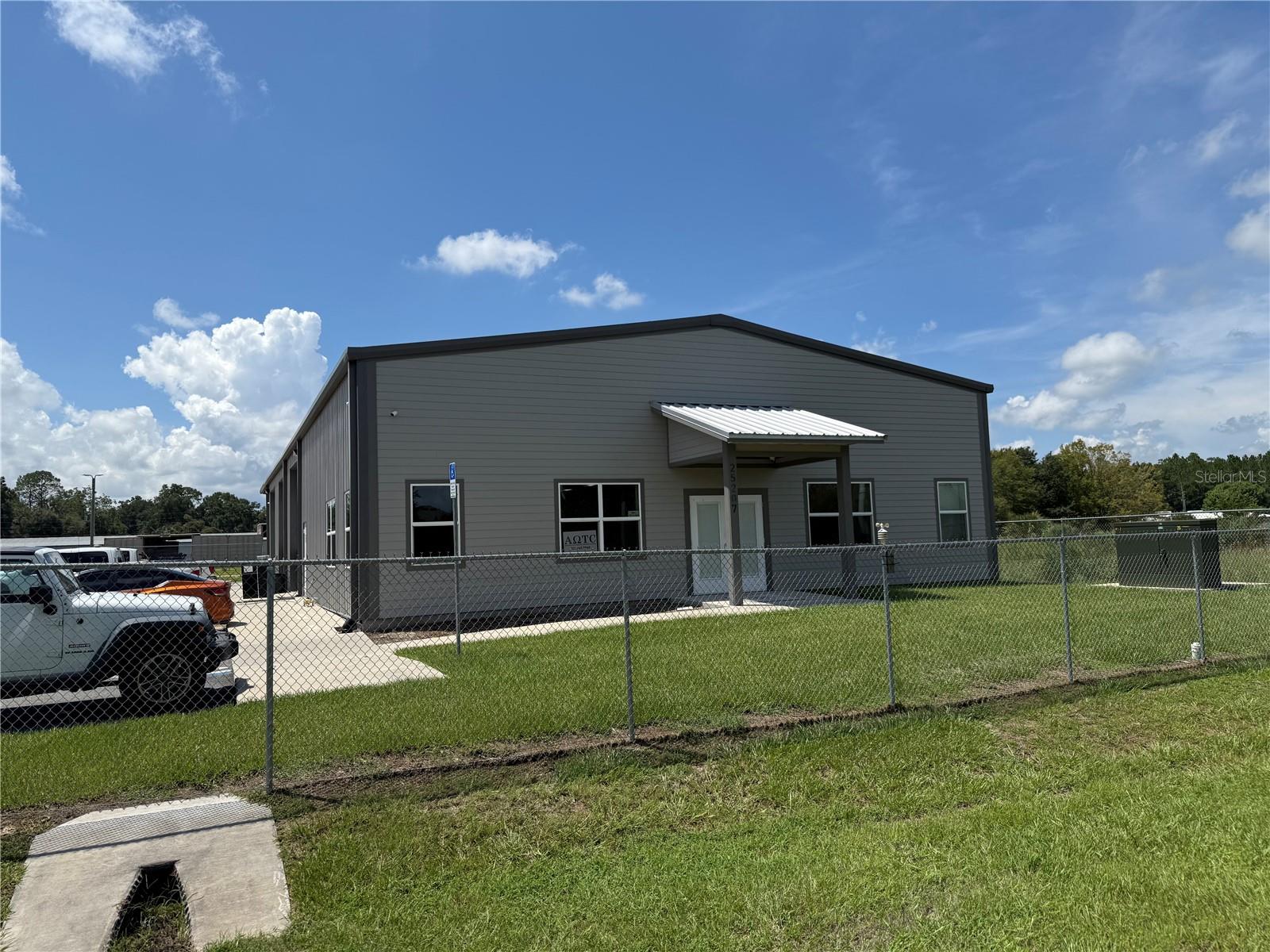This portfolio offering features two recently constructed industrial assets in Titusville and Newberry, Florida, delivering both long-term stability and future growth potential under 10-year true NNN leasebacks. The Titusville property, built in 2022, includes over 14,000 square feet of office, warehouse, and covered storage on nearly five acres with additional land available for expansion. Situated within Florida’s Space Coast, the area is fueled by aerospace, defense, and advanced manufacturing tied to Kennedy Space Center and Cape Canaveral. With direct access to I-95 and US-1, the property is connected to Orlando, Daytona Beach, and the broader Central Florida economy, while limited new supply and rising construction costs strengthen market fundamentals.

The Newberry property, constructed in 2021, complements the portfolio with diversification in the Gainesville/Newberry growth corridor. The site offers flexible CI zoning, nearly 5,000 square feet of functional space, and an additional acre of land that supports expansion or redevelopment. Positioned along Newberry Road with quick access to I-75, the location benefits from the University of Florida, UF Health, and steady population and business growth in the region. Together, the assets generate a combined NOI of $265,625, making this portfolio a compelling investment opportunity that blends Space Coast stability with Gainesville’s high-growth potential.