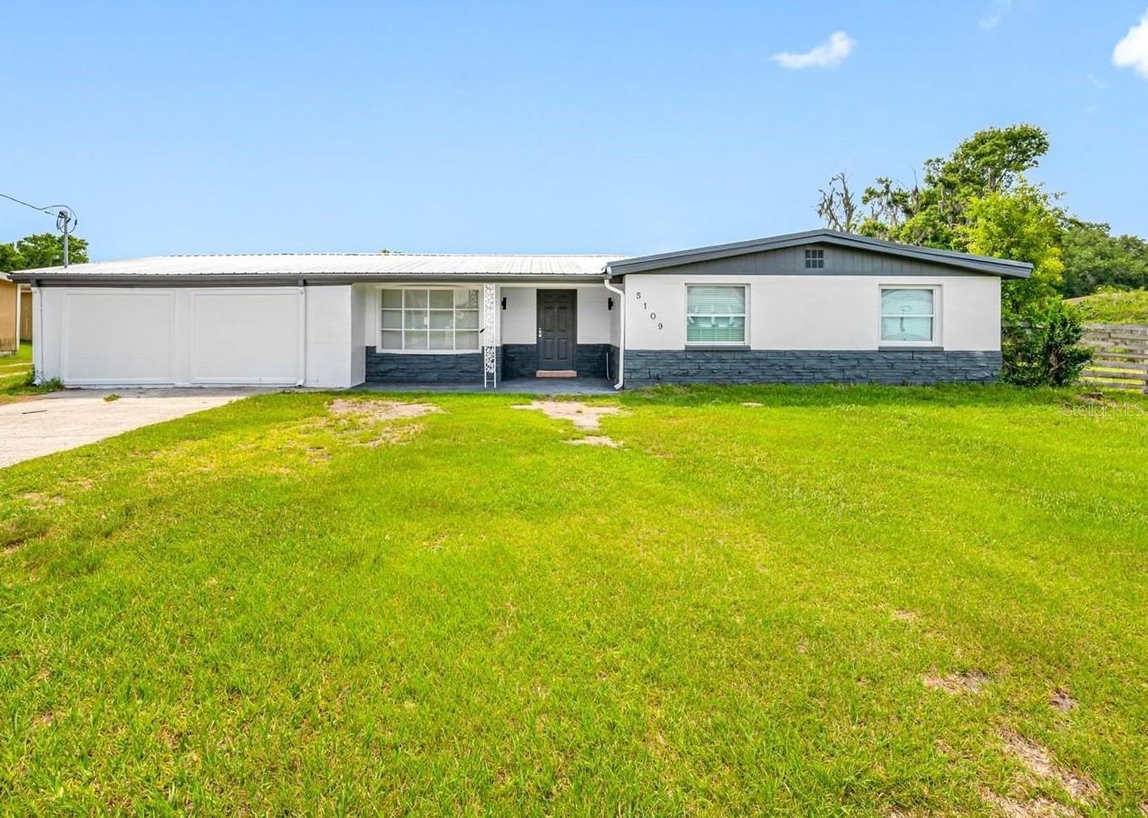 Unique opportunity for multi-generational living or an income-producing property in Plant City. Live in the newly renovated main residence while renovating the additional dwellings and creating long-term value.

This versatile property includes a move-in-ready 4-bedroom, 2-bathroom main home, a renovation-ready duplex, a separate renovation-ready 1-bedroom, 1-bathroom cottage, a well shed, and a large 4-bay pole barn/carport. Whether you are looking for future rental income, guest accommodations, or space for extended family, this property offers exceptional flexibility and potential.

A spacious 4-bay pole barn provides ample room for storage, vehicles, equipment, or workshop use. The property also benefits from a brand-new, fully permitted septic system, adding significant value and peace of mind for the next owner.

The main home features a 2025 HVAC system and an existing metal roof that appears newer and in good condition. The duplex is served by a 2013 HVAC system. Electrical service is arranged with the front home at 5111 having its own meter and panel, while the rear 5111 residence is fed from the front home. The main 5109 residence has its own electric meter and interior panel. The shed and pole barn are not currently connected to power.

The septic system includes a new 1,250-gallon tank, a new 540-gallon main lift station, and a new 540-gallon pump station serving the smaller residences.

Private financing may be available with 30% down, a term of one to three years, 2.5 points, and 10% annual interest. Proof of funds for the required down payment must accompany any offer requesting seller financing.

Seller is an investor and has never occupied the property. All room dimensions are approximate and are based on the main residence.
