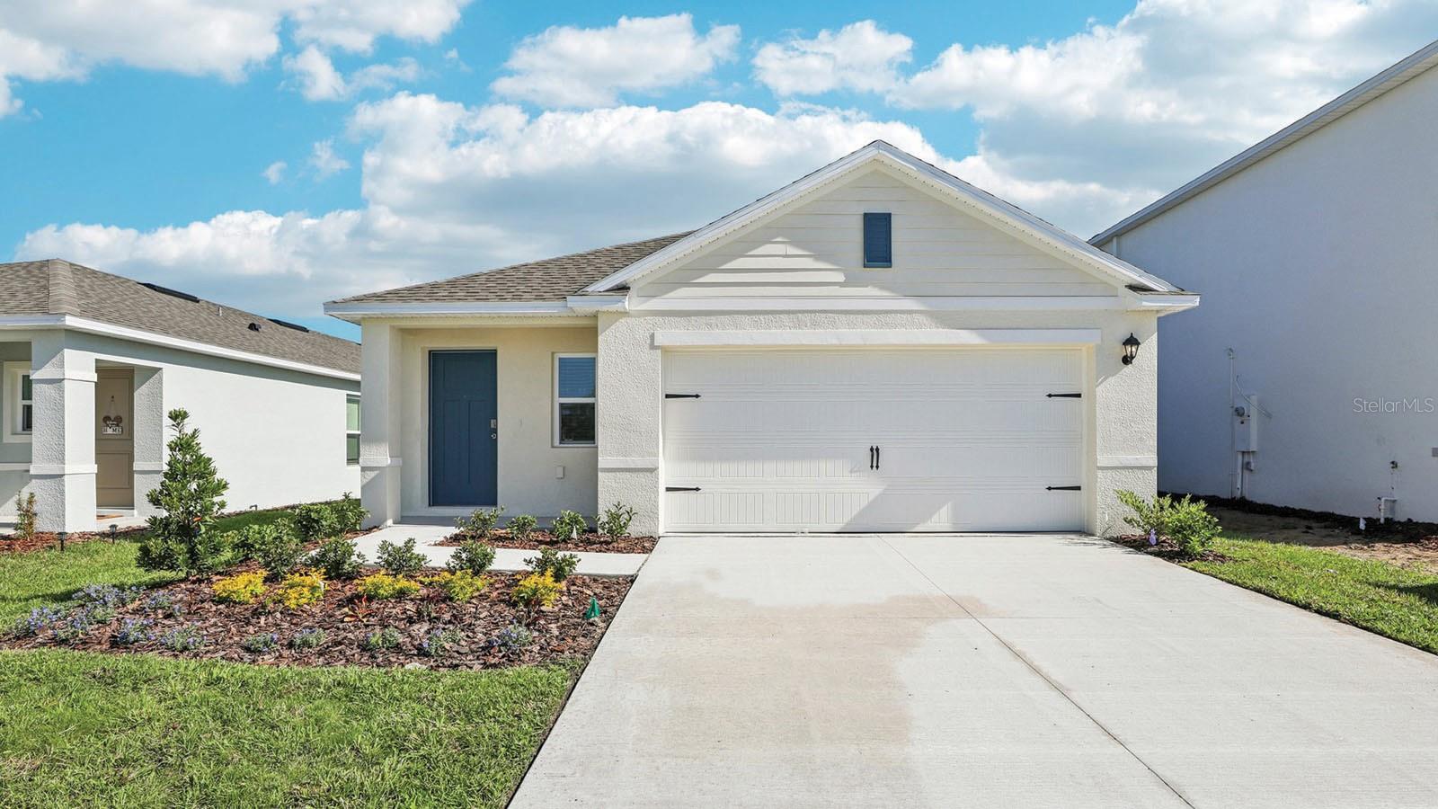 Under Construction. Discover the Downing2 floorplan at Crosswinds in Haines City, featuring 1,302 square feet, three bedrooms and two bathrooms, this home prioritizes efficient living without sacrificing an ounce of warmth.

Step inside and be greeted by a thoughtfully arranged space, designed to maximize both comfort and flow. Revwood flooring guides you through the home, setting the stage for everyday living. The heart of the Downing is its open concept living area, where the living room and kitchen merge seamlessly, fostering connection and ease. This central space, bathed in natural light, is perfect for cozy evenings or casual gatherings.

The kitchen, a model of efficiency, is equipped with modern appliances and well-organized storage, making meal preparation a breeze. Each of the three bedrooms provides a tranquil escape, with the primary suite offering a private bathroom for added convenience. The second bathroom, strategically located, serves the remaining bedrooms with ease.

Like every home in Crosswinds, the Downing 2 is built with all concrete block construction and integrated smart home technology. This allows you to effortlessly manage your home's systems, from lighting to temperature, all from the palm of your hand, whether you're relaxing inside or out and about.

The Downing 2 floorplan is ideal for those seeking a streamlined, comfortable lifestyle. It's a place where thoughtful design meets modern convenience, creating a true sense of home. Experience the blend of simplicity and sophistication at Crosswinds

Contact us today and find your home at Crosswinds.

*Photos are of similar model but not that of the exact house. Pictures, photographs, colors, features, and sizes are for illustration purposes only and will vary from the homes as built. Home and community information including pricing, included features, terms, availability, and amenities are subject to change and prior sale at any time without notice or obligation. Please note that no representations or warranties are made regarding school districts or school assignments; you should conduct your own investigation regarding current and future schools and school boundaries.*