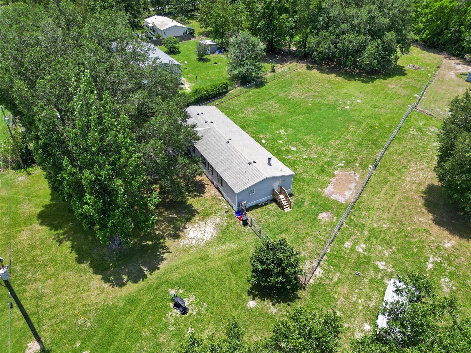 This is a Certified Pre-Owned Home -- and that changes everything. Before you ever make an offer, a licensed home inspector has already been through this home top to bottom. You will be provided with this full clean report prior to viewing at no cost. No surprises. No guessing. Just confidence. And it doesn't stop there -- your purchase comes with a 12-month Home Warranty AND our 18-month Satisfaction Guarantee: love this home, or we will buy it back or sell it for free. You won't find that anywhere else. As an added bonus you also qualify for a 1% lender credit at closing if you use our preferred lender. 

Welcome to this wonderful 4-bedroom, 2-bathroom mobile home located in the private Rolling K subdivision in Archer. Situated on 1.21 high and dry acres with agricultural zoning, this property offers the freedom to bring your animals with no HOA or deed restrictions. Enjoy peaceful country living while benefiting from a well-maintained paved public road for easy access.

Inside, you’ll find over 1,900 square feet of living space featuring a spacious floor plan, generous bedrooms, and plenty of room for the whole family. Major updates include a roof installed in June 2022 and an HVAC system replaced in 2016, providing added peace of mind for the new owner.

Conveniently located just a short drive from Gainesville, this property offers the perfect balance of rural living and access to shopping, dining, healthcare, and employment opportunities. Starlink high-speed internet is already in place, making remote work, streaming, and online connectivity a breeze.

Financing options include VA, FHA, USDA, and Conventional loans, making this an excellent opportunity for homeowners and investors alike.