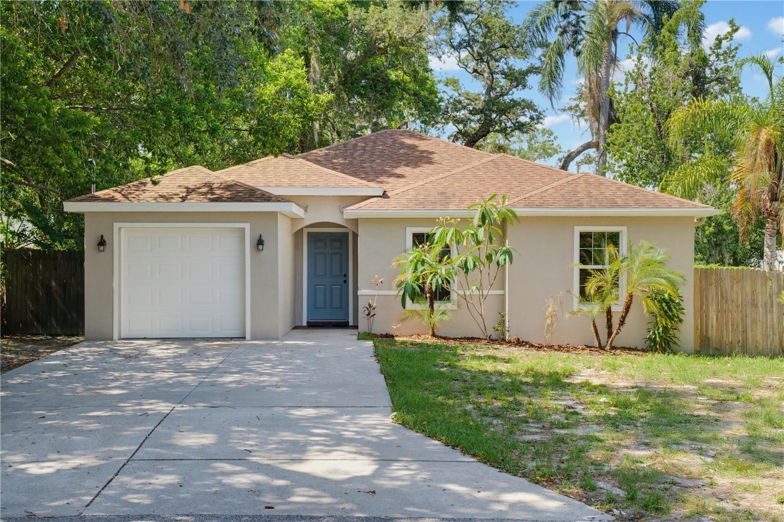 RARE FIND! In a neighborhood where many homes were built decades earlier, this 2015 built home offers newer construction, attached 1-car garage, & modern finishes.  
No need to settle for a choppy floor plan! This beauty is perfectly designed at 1342 sqft with 3bd/2ba, inside laundry & spacious closets! The vaulted ceilings and an open floor plan create a bright, spacious feel in the main living areas. Tile floors throughout plus NEW PAINT inside and out.
The kitchen is equipped with granite countertops, espresso-colored cabinetry, stainless steel appliances, and a pantry for additional storage.
The spacious owner's suite is situated in the back of the home and includes a walk-in closet, dual sinks, and a walk-in shower. Two additional bedrooms offer flexibility for family, guests, or a home office. A second full bathroom features granite countertops and matching espresso cabinetry.
Outside, a covered and screened patio provides a comfortable space to relax or entertain while overlooking the backyard.
The extra wide driveway allows for multiple cars to be parked without blocking access to the garage. 
Located in the heart of Tampa, this home is approximately 5 miles from downtown Tampa, 7 miles from Tampa International Airport, and 3 miles from Raymond James Stadium. Popular restaurants, grocery stores, coffee shops, professional services, ZooTampa, and other local attractions are all just minutes away!