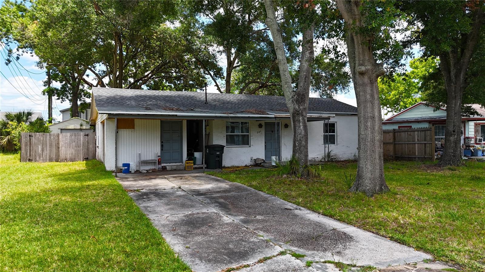Located within Winter Garden’s golf cart district and just minutes from Plant Street, this property offers a distinctive combination of current residential use, C-2 General Commercial zoning, and no HOA. The single-story, concrete-block home includes 2 bedrooms, 1 bathroom, 1,034 square feet of heated living space, an enclosed porch that provides additional flexible space, and a roof replaced in 2023. The interior is ready for renovation, allowing the next owner to update the property according to their intended use and vision. Situated on an approximately 0.19-acre homesite, the property also features mature shade trees, a concrete driveway, and fenced sections of the yard. Its central Winter Garden location provides convenient access to the restaurants, shops, farmers market, community events, and West Orange Trail surrounding downtown and Plant Street, while nearby golf-cart-friendly roadways offer another way to explore the area. Whether considered for continued residential use, a renovation project, or a future business opportunity, this property presents a range of possibilities in a well-connected location. Buyers should independently verify all intended uses, permitting requirements, and zoning regulations with the City of Winter Garden.