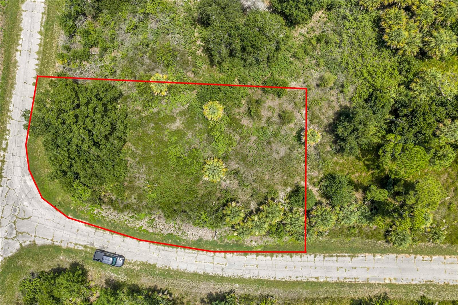 Virtually Staged. Rare opportunity to purchase two adjacent lots being sold together in North Port! Positioned at the corner of Halleck Street and Hinshaw Avenue, this oversized homesite offers additional space, privacy and flexibility to bring your vision to life. Build your dream home with plenty of room to create the outdoor living space you’ve always wanted, subject to applicable zoning and permitting requirements. Conveniently located near shopping, dining, recreation and all that growing North Port has to offer! Conceptual AI-generated renderings are included to showcase the property’s potential and are for inspiration only. Renderings do not represent approved plans or improvements included with the sale. Parcels 1149214721 and 1149214720 are being sold together. Buyer to verify all lot dimensions, utility availability, zoning, environmental conditions and building requirements.