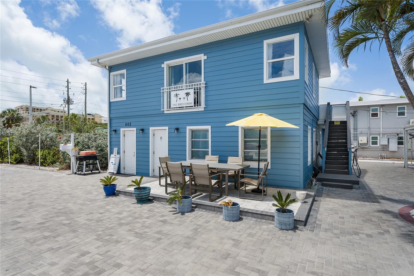 Beautifully located in the heart of Clearwater Beach, this 10-unit motel sits on over 1/3 acre of prime coastal property. Currently operating successfully as an Airbnb, this property offers both immediate income potential and long-term investment value. Guests can enjoy a sparkling outdoor pool, ample off-street parking, and an unbeatable location. Just one block from the Intracoastal Waterway—perfect for breathtaking sunrises—and one block from public Gulf beach access, for stunning sunsets await. Whether you're looking to expand your hospitality portfolio or own a slice of Florida’s most sought-after beach destination, this property delivers on location, flexibility, and charm. Could be redevelopment site