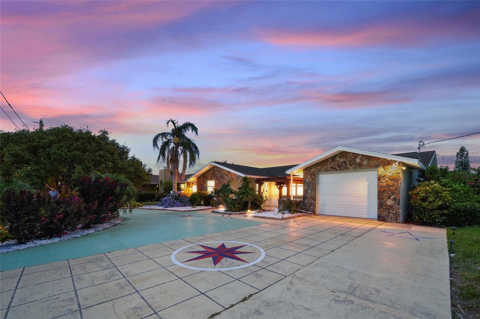 Welcome to this waterfront oasis located at 8542 Betty St in Port Richey, where your backyard serves as the gateway to the Gulf. This exceptional property features a private dock situated on a deep canal, providing effortless, direct water access for boaters and outdoor enthusiasts. Out front, a convenient circular driveway offers excellent curb appeal and plenty of parking for family and guests. Inside, the heart of the home boasts a beautifully refurbished kitchen equipped to handle everything from quick weeknight meals to coastal entertaining. The interior also features a large, luxurious jacuzzi tub that stays with the property for your ultimate relaxation. Complete with a versatile freestanding storage shed in the yard, this home perfectly combines functional layout with the ultimate Florida waterfront lifestyle.