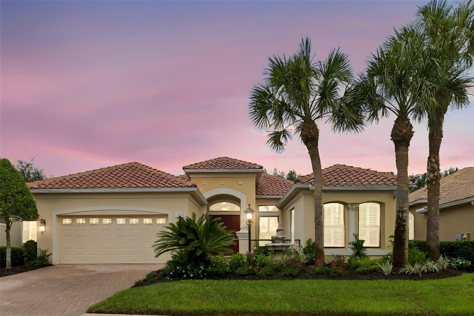 Welcome to this beautifully updated 3-bedroom, 3-bath pool home with a private den, nestled behind the gates of Lakewood Ranch Country Club. This meticulously maintained residence offers an exceptional blend of elegance, comfort, and modern upgrades.
The heart of the home is the stunning, newly remodeled kitchen featuring a one-level quartzite breakfast bar, marble backsplash, abundant cabinetry, walk in pantry with custom shelving and a charming breakfast nook—perfect for casual dining and entertaining.  Formal living and dining rooms provide timeless sophistication, while the expansive family room has an open, inviting atmosphere.
The primary suite has a tray ceiling, French doors that open to the pool and lanai, an en suite bathroom with a soaking tub, walk- in shower and separate toilet closet. It has his/her  closets complete with custom built in closet systems. The two generously sized guest rooms have large closets and a pocket door to separate from the rest of the house for privacy. The spacious den has custom built-in cabinets and easy access to the pool through a large slider. This space is perfect for a home office or a quiet study.
Step outside to your very own private oasis. The gorgeous custom-designed pool features a spa with fountain, a large covered living area , a full pool bath,  built- in kitchen with granite counter tops,  stainless grill and fridge. An ideal space for cooling off on sunny Florida days, enjoying family fun, or hosting weekend get-togethers. Your backyard retreat provides the perfect balance of relaxation and luxury. 
This home showcases soaring volume ceilings, hurricane impact glass windows and doors, fresh interior paint, tankless gas hot water heater, whole house water conditioning system and newly landscaped grounds, providing peace of mind and outstanding curb appeal.  In a maintenance free neighborhood
this home is perfect for seasonal residents yet large enough for year round living. In the Lakewood Ranch Country Club community, residents enjoy a premier lifestyle with optional golf, tennis, fitness, and social memberships, Ideally situated close to top-rated schools, shopping, dining, and the areas award winning beaches. Easy access to major highways makes commuting a breeze, while the tranquil surroundings offer a peaceful retreat from the bustle of daily life. This exceptional home in is ready for you to move in and start making memories. Schedule your private tour today and experience the luxury and comfort that this Salerno model has to offer.