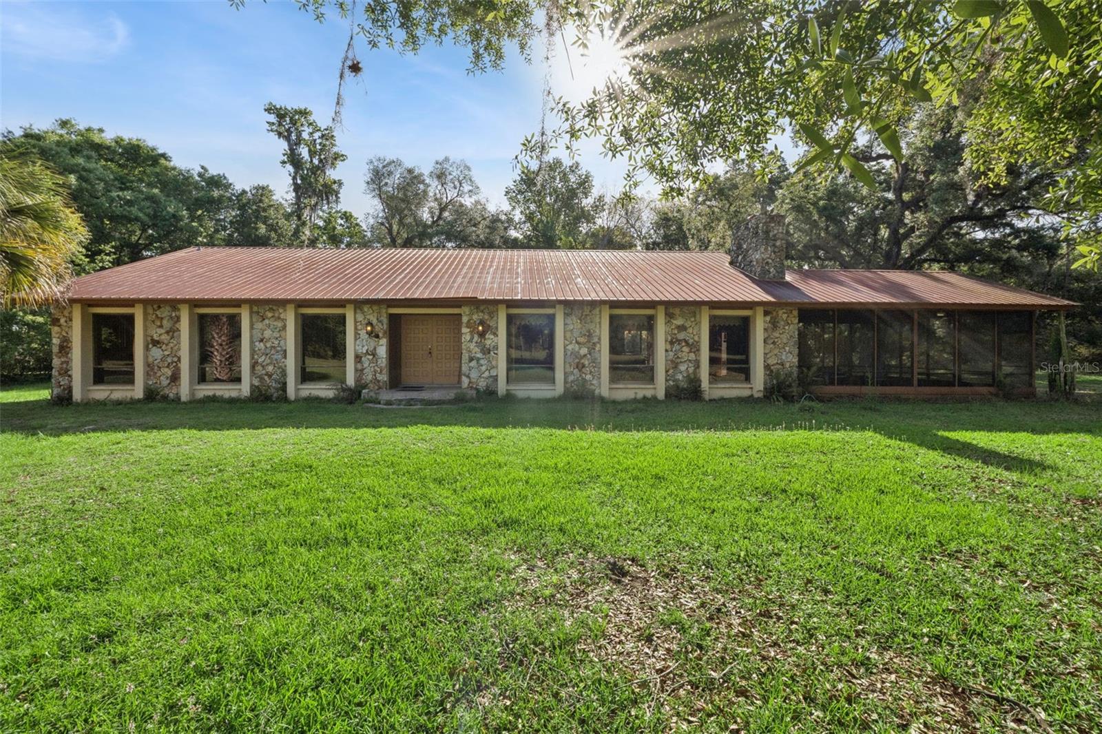 Discover a truly unique opportunity to own 20 private acres off Lake Mills Rd, surrounded by high-end estate homes. This exceptional property offers the perfect blend of space, privacy, and versatility—with no HOA restrictions.
The existing home features 4 bedrooms and 2.5 bathrooms, highlighted by an open floor plan with a sunken living room, formal dining area, separate dinette, and a spacious kitchen with an island. The family room showcases decorative wood beams, adding warmth and character, while the large screened, covered patio provides the perfect place to relax and enjoy the peaceful surroundings.
The primary suite includes a walk-in closet, dual sinks, and a walk-in shower for added comfort.
Outside, the property is fully equipped for country living and recreation, featuring:
Pole barn
Multiple storage buildings
Additional barn
Mature trees and lush greenery
A natural creek running through the land and lots of trails for ATV's or 4 wheelers 
With abundant wildlife and wide-open space, this property is ideal for those seeking privacy, outdoor adventure, or a place to create their dream estate. Bring your horses, RVs, boats, ATVs, and more—there’s room for it all.