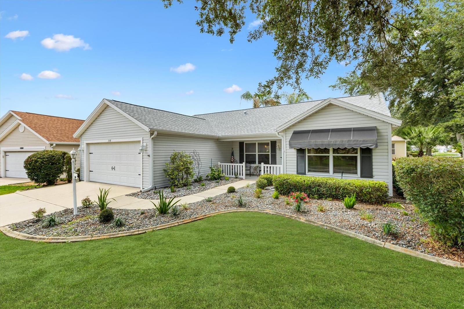 WELCOME HOME to this beautifully updated home situated on a desirable corner homesite in The Villages®, offering exceptional value with the BOND PAID, a significant savings for future owners.

Step inside and immediately appreciate the light, bright, and open floor plan where the living room, dining area, and kitchen flow seamlessly together, creating the perfect space for entertaining family and friends. The kitchen features granite countertops, stainless steel appliances, gas cooking, and abundant cabinetry, making meal preparation both functional and enjoyable.

One of the most desirable features of this home is the split bedroom floor plan, providing privacy and comfort for both homeowners and visiting guests. The spacious primary suite is thoughtfully separated from the guest bedrooms, creating a private retreat at the end of the day while offering family and friends their own comfortable space.

Throughout the home, you'll find hard surface flooring with tile in the entryway, kitchen, and bathrooms, providing both style and easy maintenance. Recent major updates include a new roof in 2022, HVAC replaced in 2014, newer gas range and refrigerator, microwave, washer and dryer, fresh interior paint, updated baseboards, new electrical switches and outlets, updated lighting fixtures, ceiling fans, faucets, hardware, and much more.

The primary suite offers comfort and convenience, while the guest accommodations provide privacy for visiting family and friends. Additional improvements include custom closet systems, refreshed cabinetry, updated bathroom fixtures, new toilets, a barn style glass shower enclosure in the guest bath, and under cabinet lighting in the kitchen.

Outdoor living is equally inviting with a covered patio area perfect for enjoying Florida's beautiful weather year round. The corner homesite provides additional space, privacy, and curb appeal.

Location is everything, and this home delivers. Conveniently located near everyday shopping, dining, medical facilities, and recreation, you'll also enjoy quick access to two of The Villages® most popular country clubs, Nancy Lopez Country Club and Glenview Champions Country Club. You'll also appreciate being near the Polo Fields and ideally positioned between Spanish Springs® Town Square and Lake Sumter Landing® Market Square, making shopping, dining, entertainment, and nightly live music easily accessible.

This move in ready home combines major system updates, thoughtful renovations, a desirable split bedroom layout, a prime location, and the tremendous value of a PAID BOND, making it a must see opportunity in The Villages®.