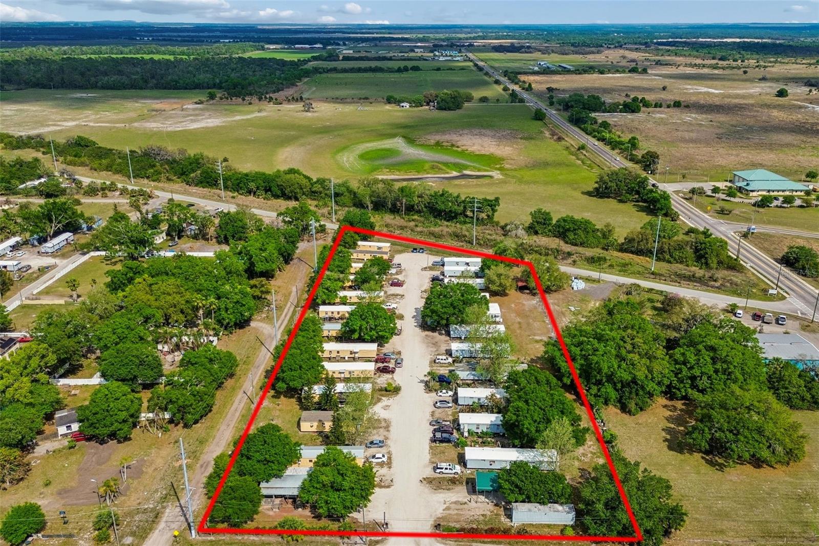 If you're looking for a simple, easy-to-run CASH COW, look no further. This is a unique opportunity to take the money to the bank and collect.  Located in Wimauma, Florida, in Hillsborough County within the thriving Tampa MSA, this 32-unit mobile home park features a mix of long-term mobile units and weekly room rentals, providing consistent income. The property also includes a full laundry facility and an additional RV campsite with hook-ups for added rental income.

Situated on 3.14 acres with transient lodging zoning under a planned development within the county land development code, the property is located just off State Road 674 (19,300 AADT) and only minutes from national grocers, retail, and service providers. The site also offers quick access to the I-75 interchange to the west.

Wimauma is one of Central Florida’s emerging boomtowns, with the population of this unincorporated community more than doubling since 2010. Located approximately 30 miles southeast of Tampa, the area is experiencing substantial residential growth, including Metro Lagoons Southshore Bay (3,000± homes at full buildout), Sunshine Village (2,800± homes), DG Farms/Sereno (2,700± homes), along with several additional master-planned communities. The immediate trade area includes a strong mix of active adult and family households, creating diverse demand drivers for retail, medical, service, and specialty commercial uses.